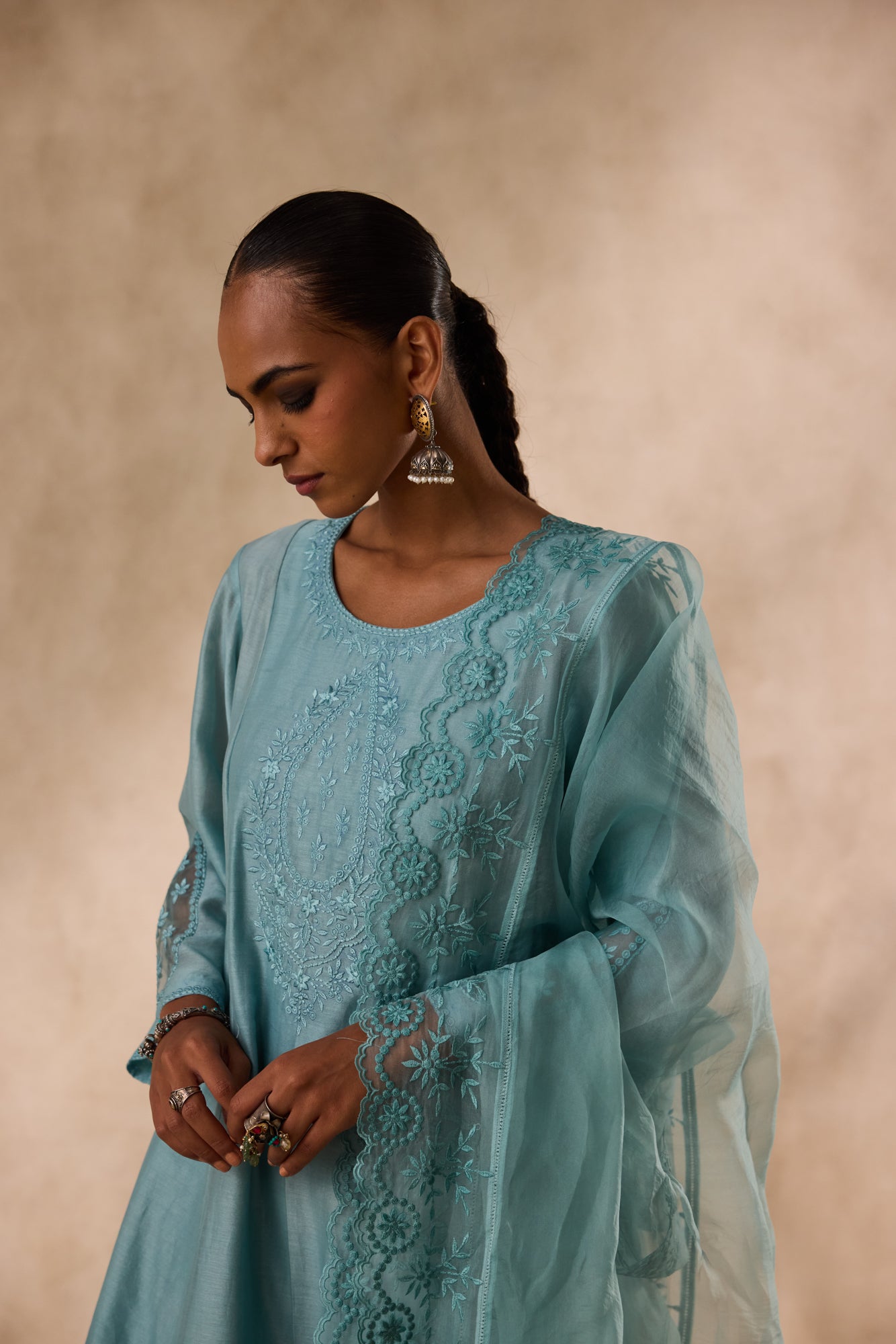 Sky blue chanderi floral resham embroidered kurta paired with organic cotton slip, pant & organza dupatta