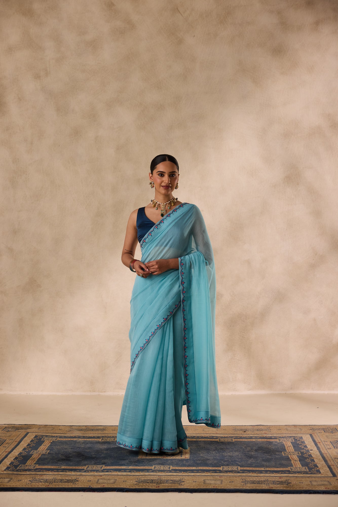 Sky blue chanderi scalloped embroidered saree comes with unstitched & unembroidered blouse fabric in chanderi