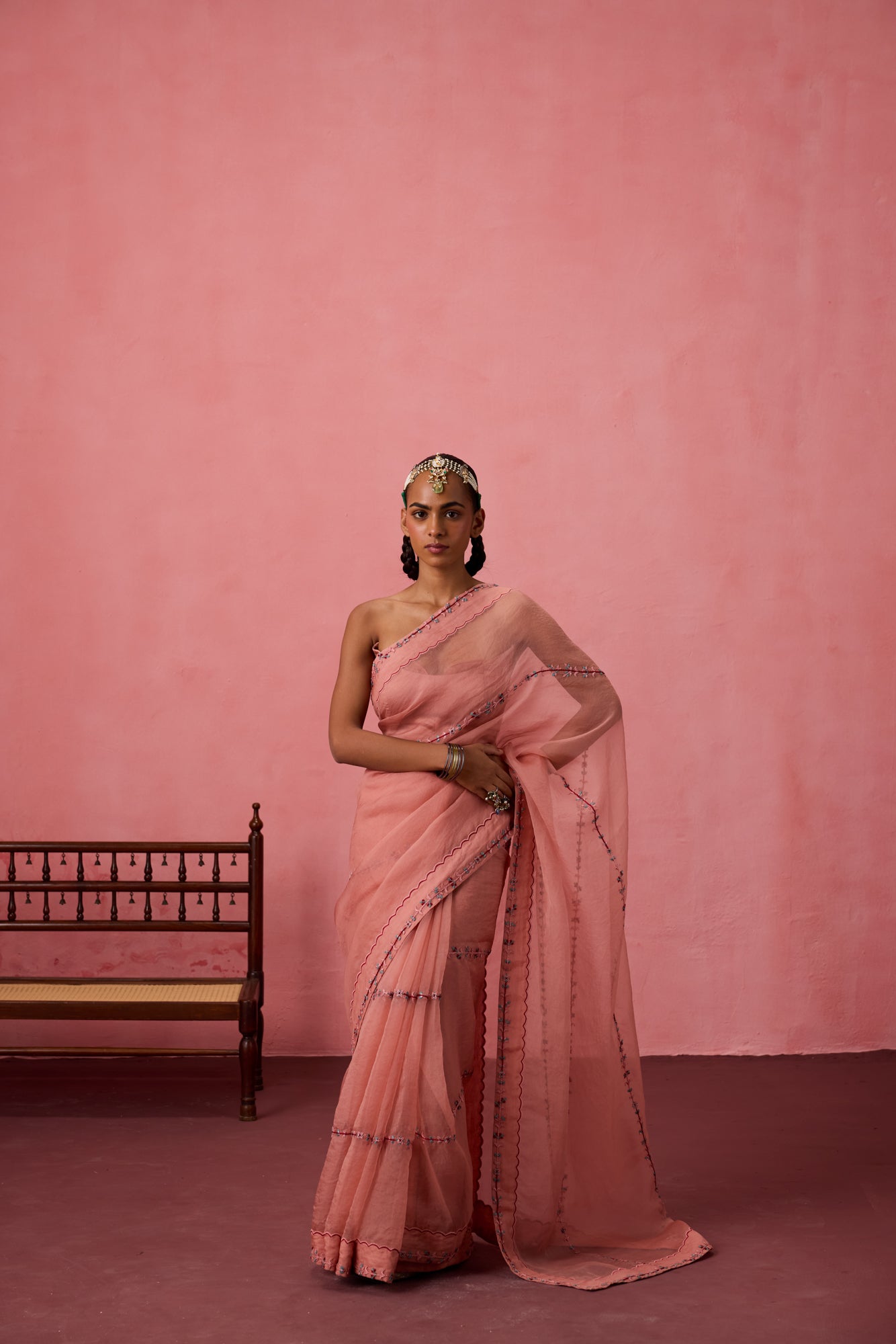 Peach organza embroidered saree comes with unstitched & unembroidered blouse fabric in chanderi
