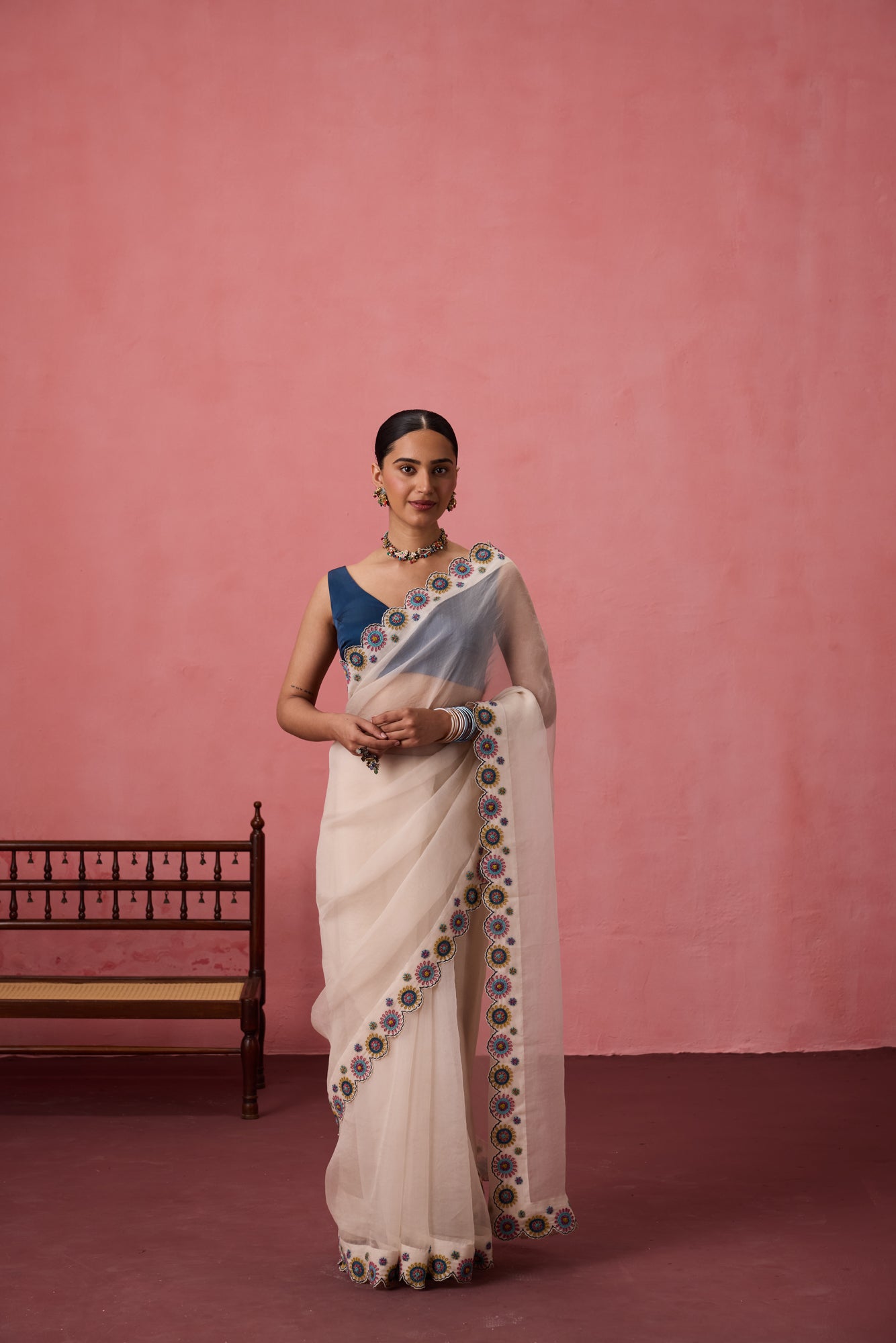 Ivory organza heavy scalloped cutwork embroidered saree comes with unstitched & unembroidered blouse fabric in chanderi