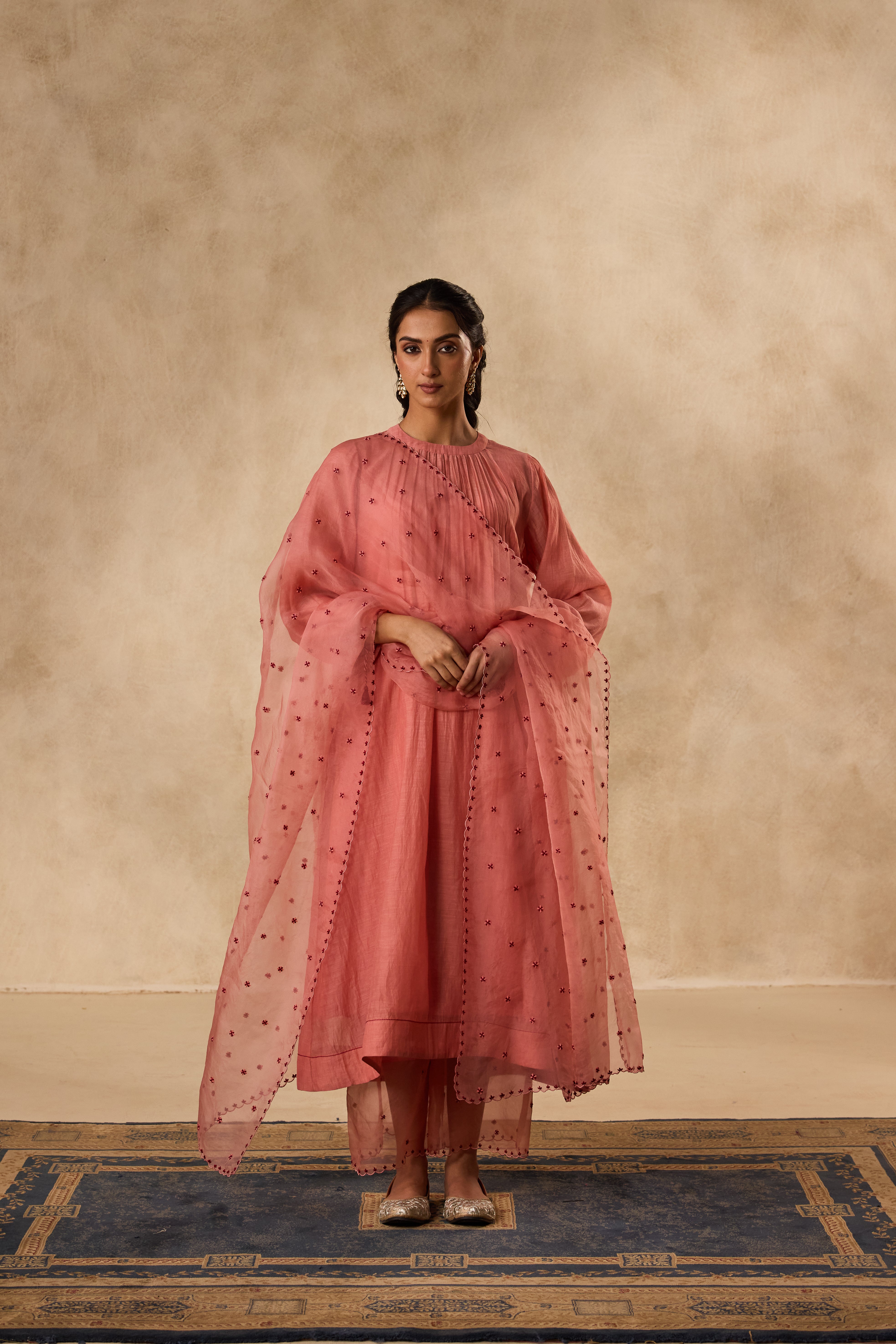 PEACH CHANDERI CROSS STICH EMBROIDERED TUNIC PAIRED WITH ORGANIC COTTON SLIP & MATCHING PANT & ORGANZA DUPATTA