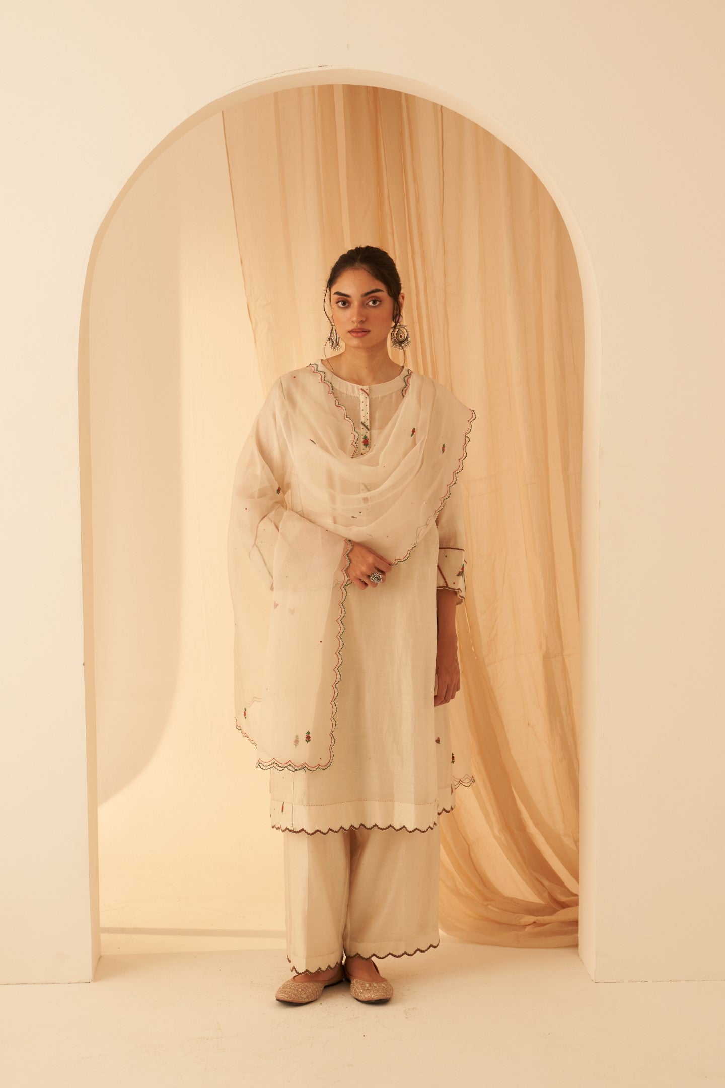 Ivory Chanderi kurta paired with cotton slip, salwar & organza dupatta