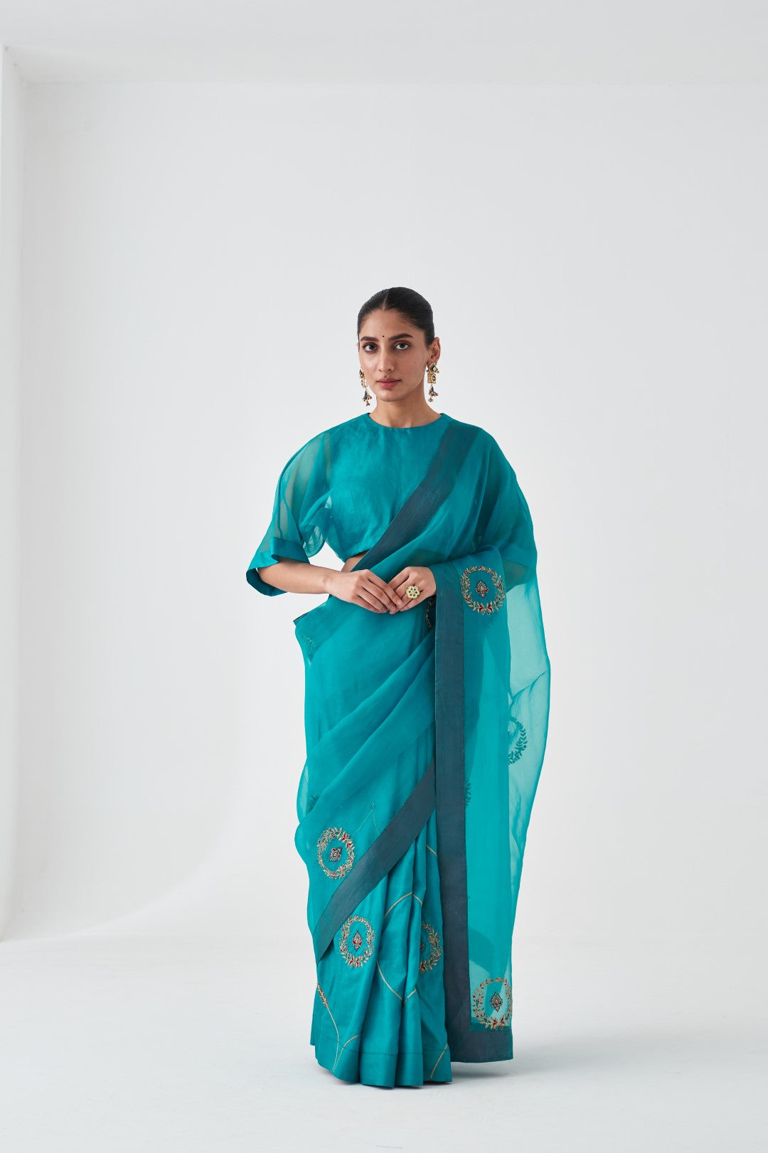 Turquoise Organza Embroidered Saree Paired with Organic Cotton Stitched Petticoat (02 pcs.)