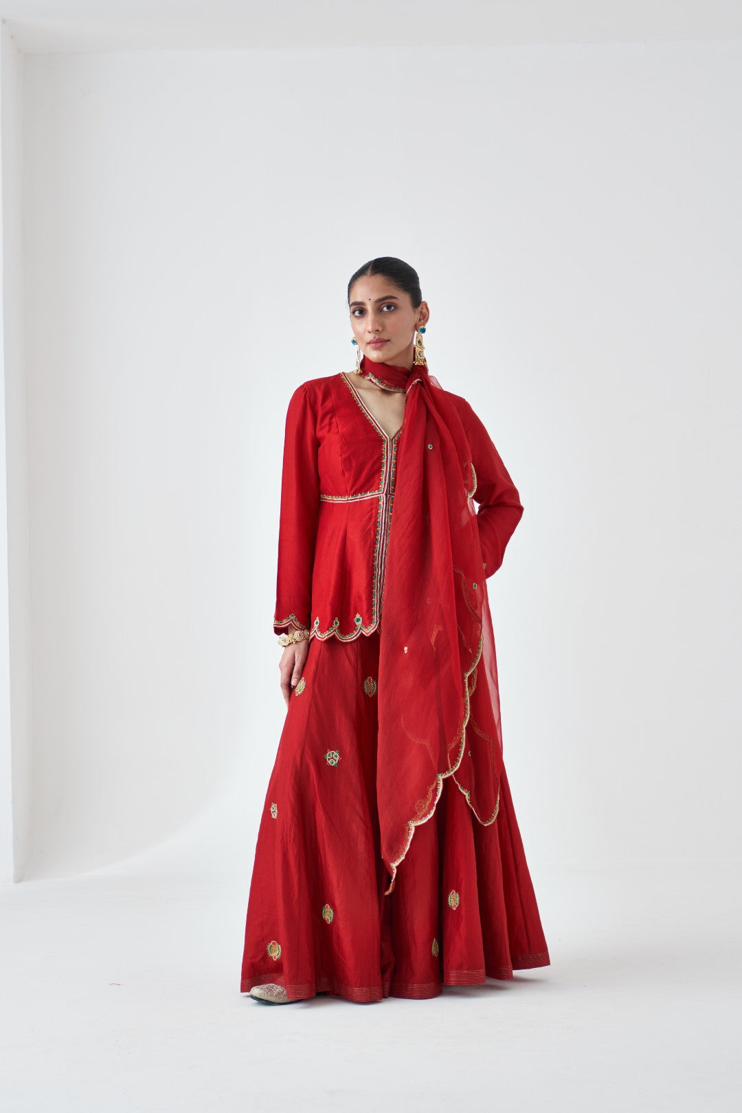 Maroon Silk Dupion Embroidered Peplum Paired with Silk Sharara & Organza Dupatta (03 PCS.)