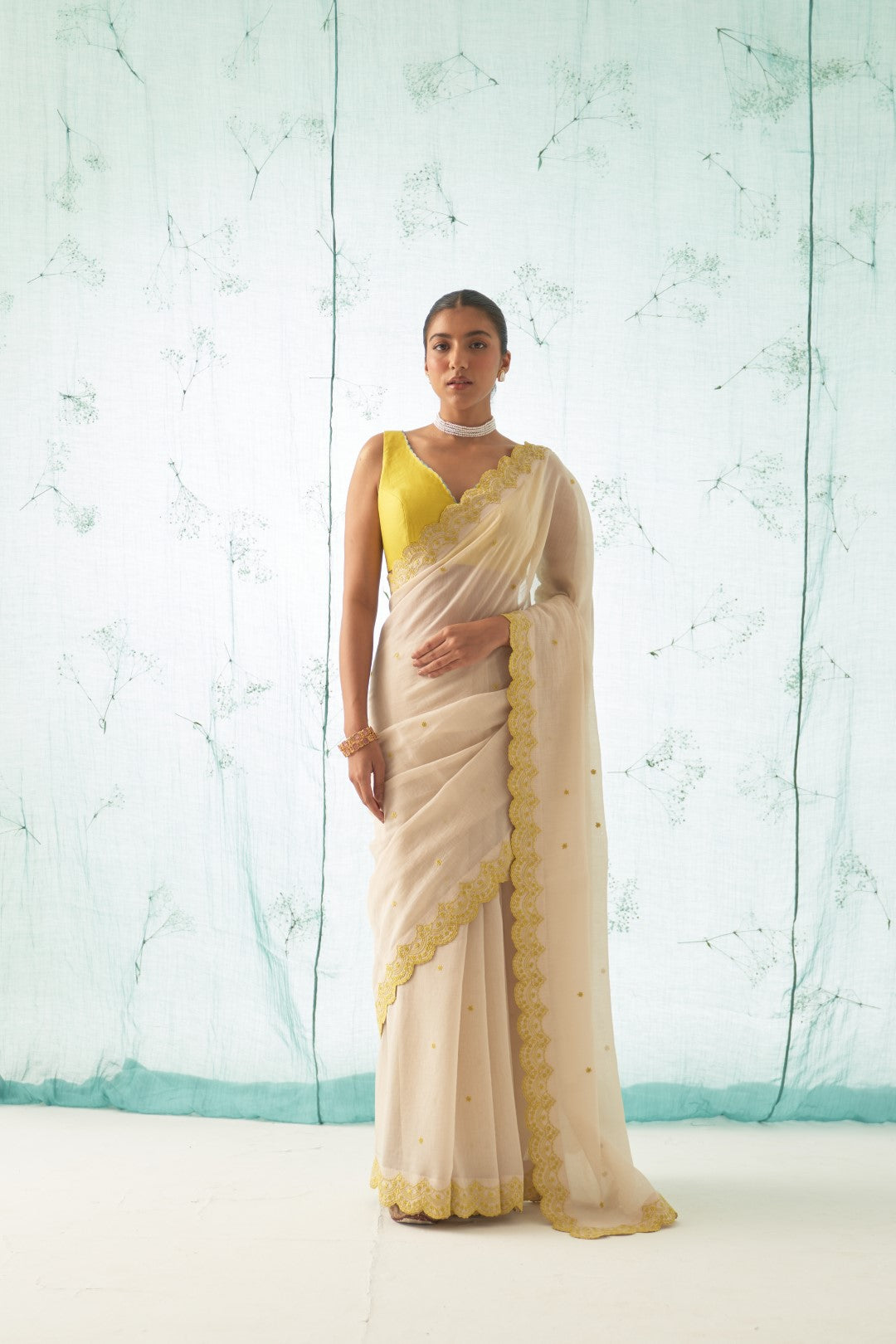 Ivory Chanderi Saree Set with Yellow Scallop Border, Stitched Blouse, and Organic Cotton Petticoat – A Classic Choice in Chanderi Sarees