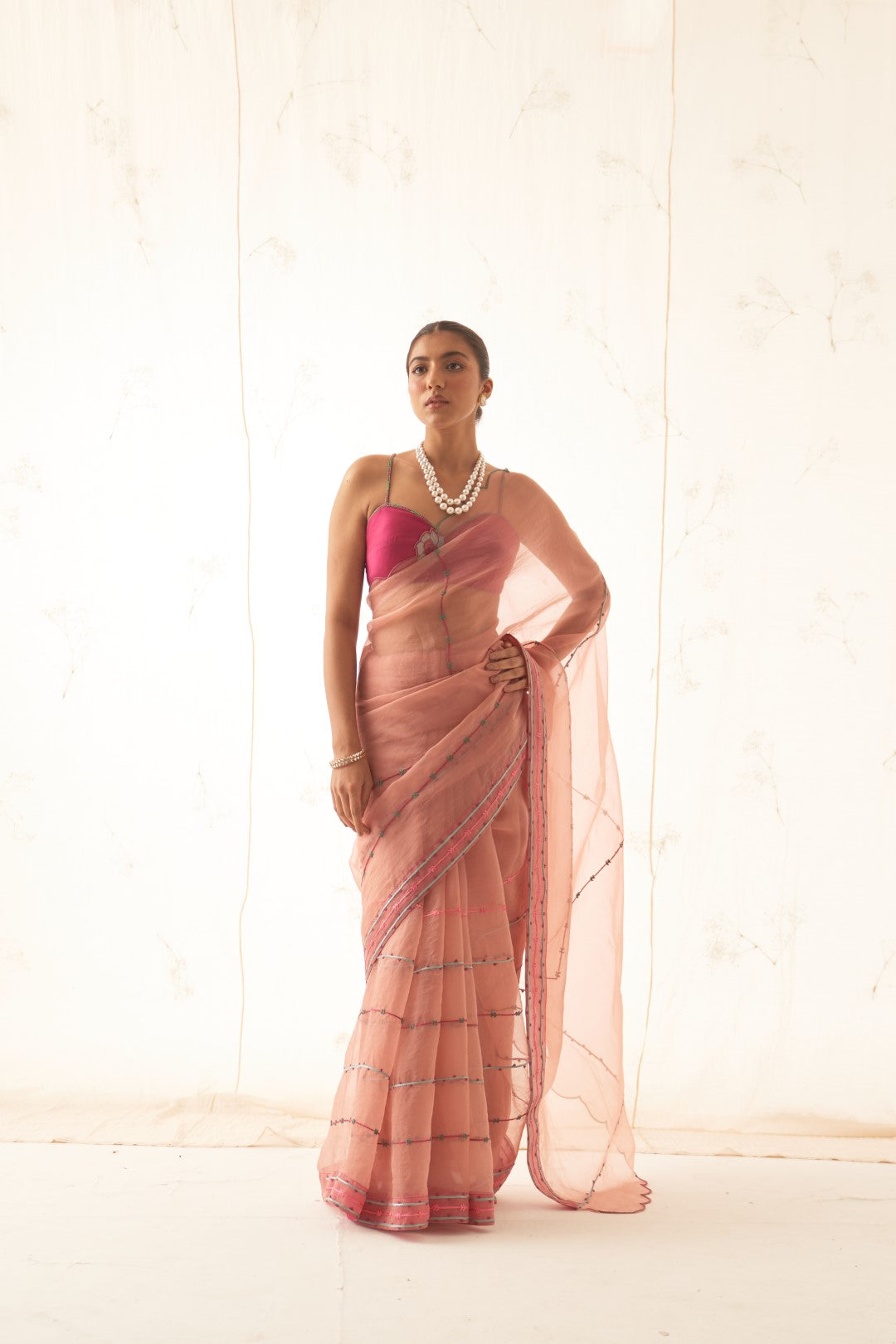 Peach Organza Saree with Embroidery Allover Comes With Chanderi Stitched Blouse and Organic Cotton Stitched Petticoat ( 03 Pcs. )