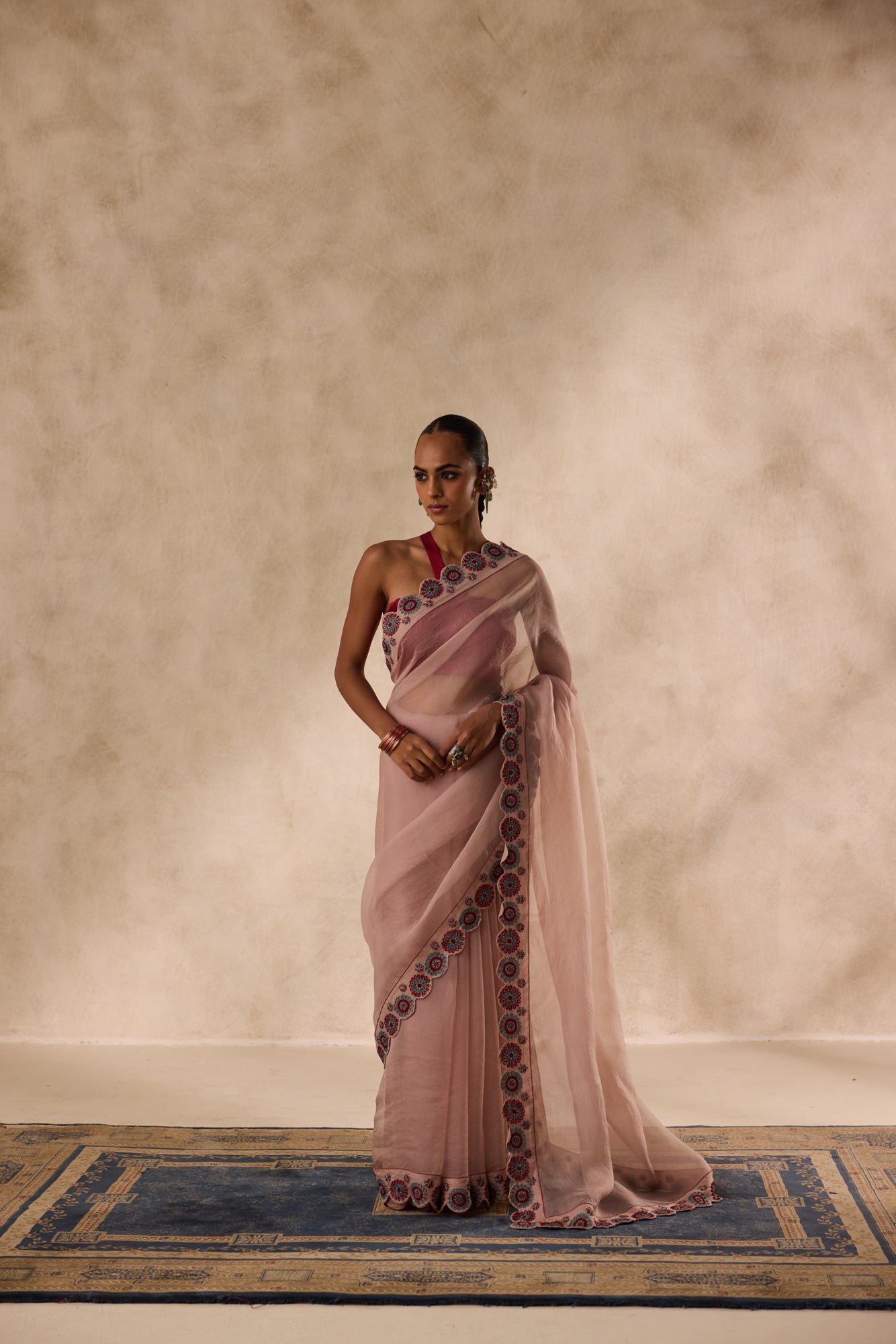 Rose gold organza heavy cutwork border embroidered saree comes with unstitched & unembroidered blouse fabric in chanderi