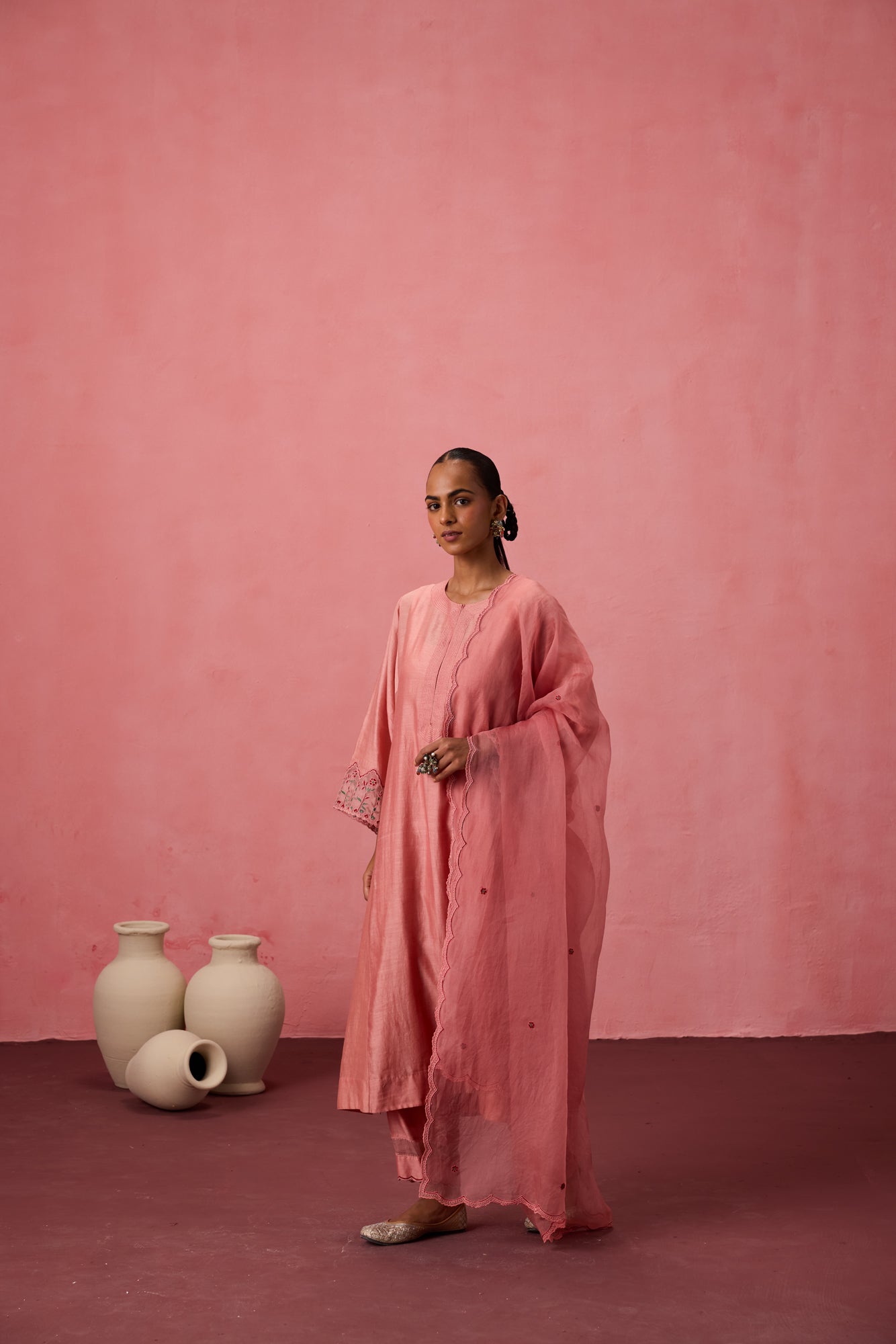 Peach chanderi embroidered kurta with embellished border on sleeves paired with an organic cotton slip pant & organza dupatta
