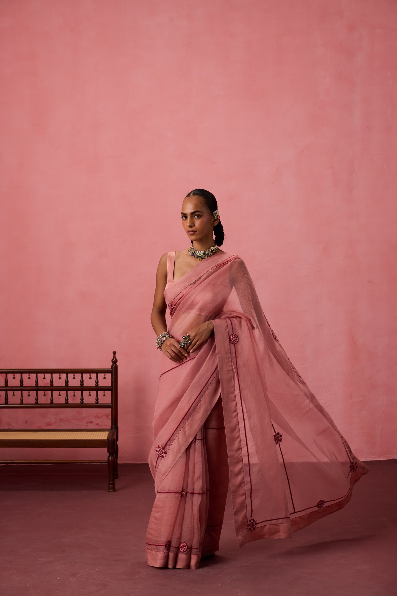 Peach organza embroidered saree comes with unstitched & unembroidered blouse fabric in chanderi