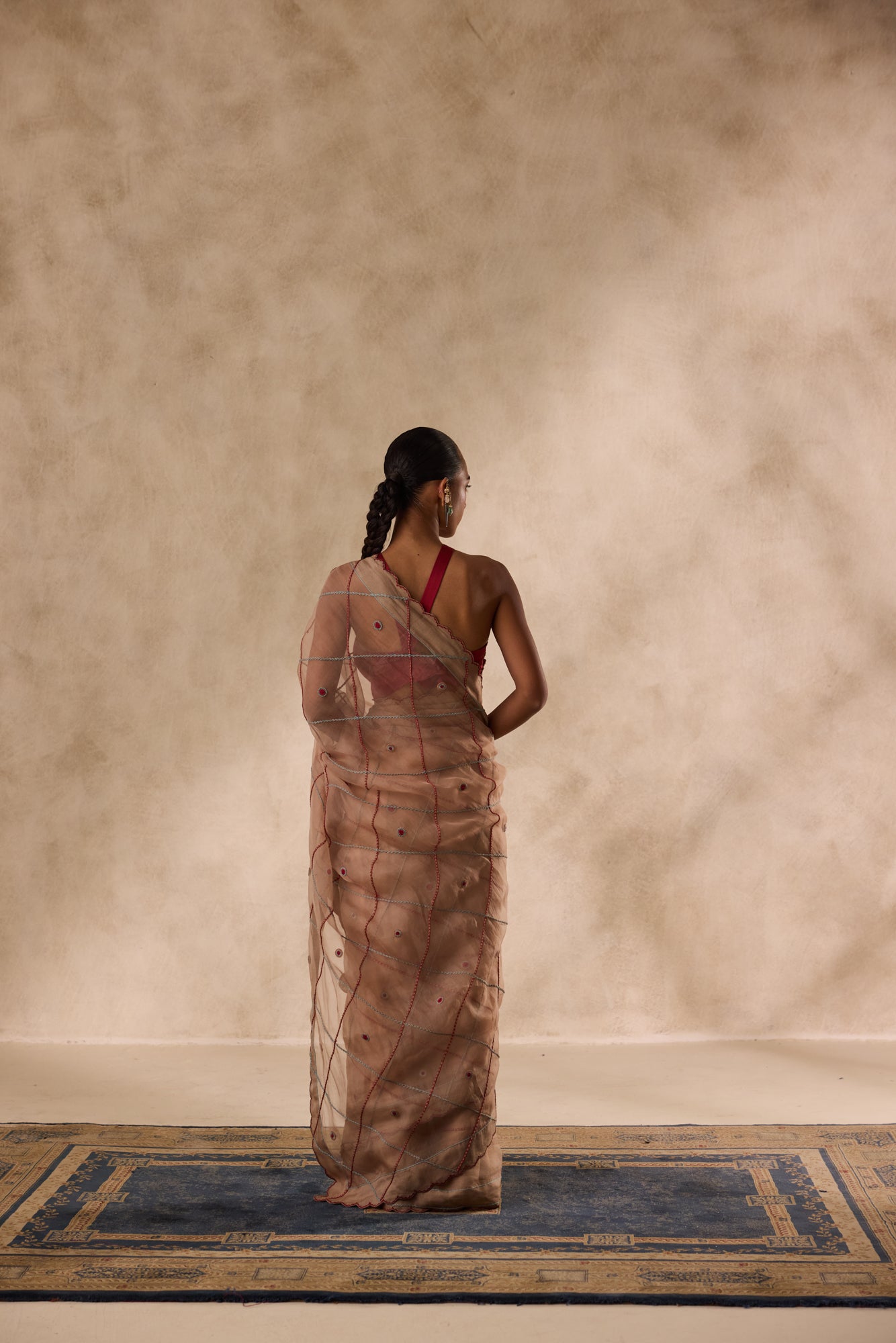 Beige organza jaal embroidered saree comes with unstitched & unembroidered blouse fabric in chanderi