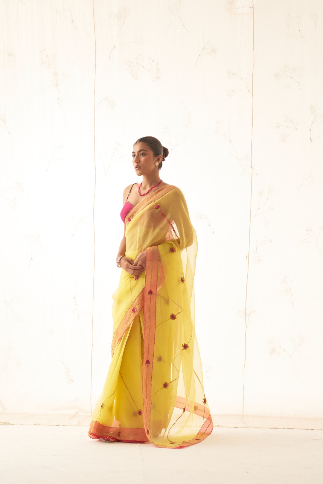 Yellow Organza Saree Set with Pink Border Comes With Stitched Chanderi Blouse and Organic Cotton Stitched Petticoat ( 03 Pcs. )