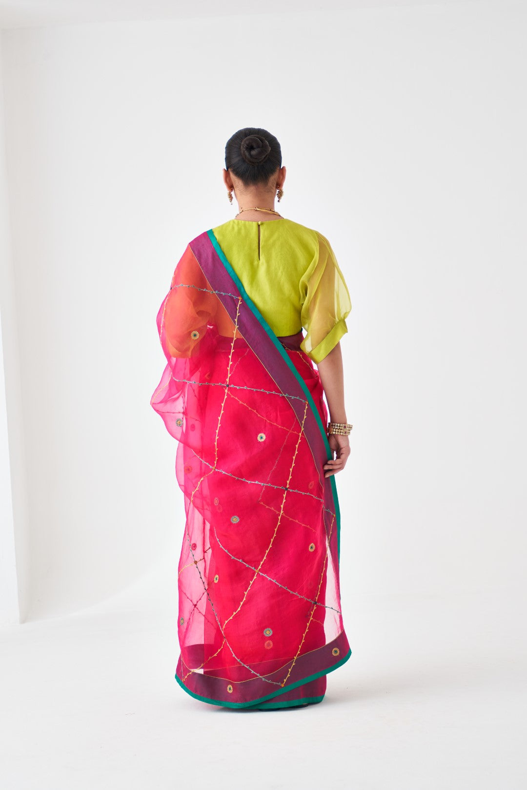 Fuchsia Organza Jaal Embroidered Saree Paired with Organic Cotton Petticoat (02 pcs.)