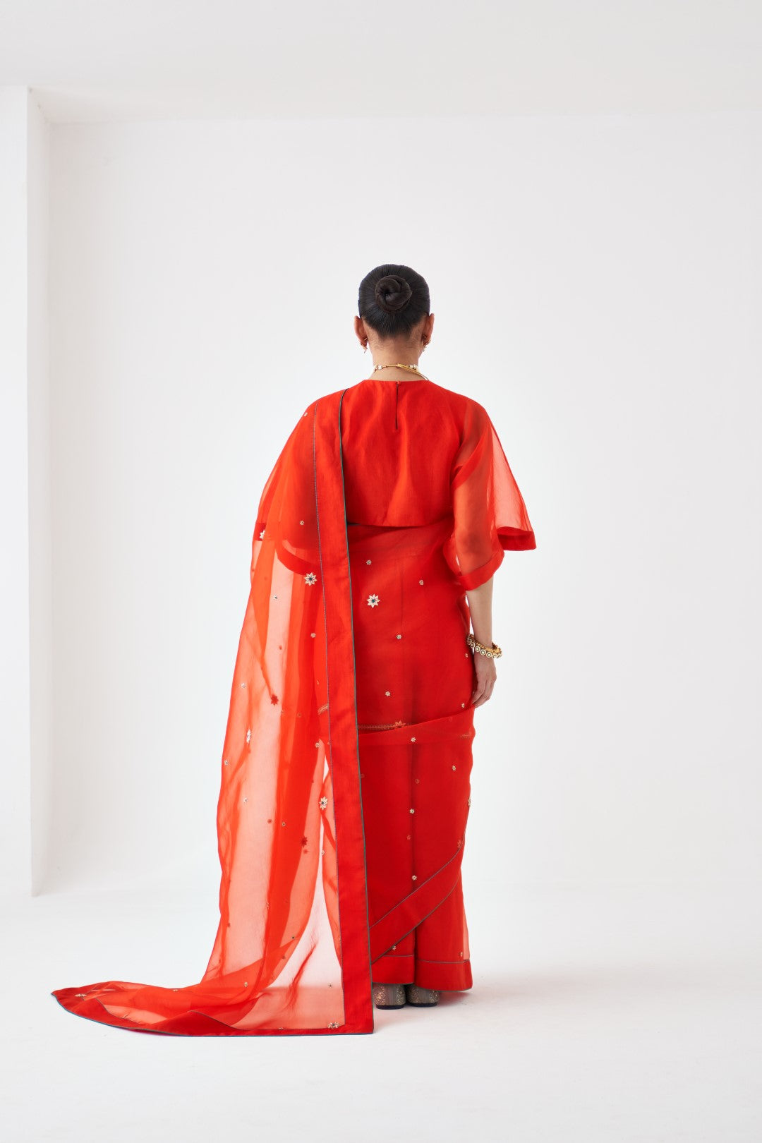 Orange Embroidered Organza Saree Paired with Organic Cotton Stitched Petticoat (02 Pcs.)
