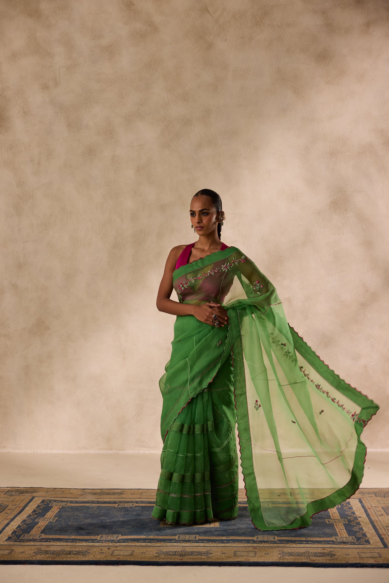 Green organza embroidered saree comes with unstitched & unembroidered blouse fabric in chanderi
