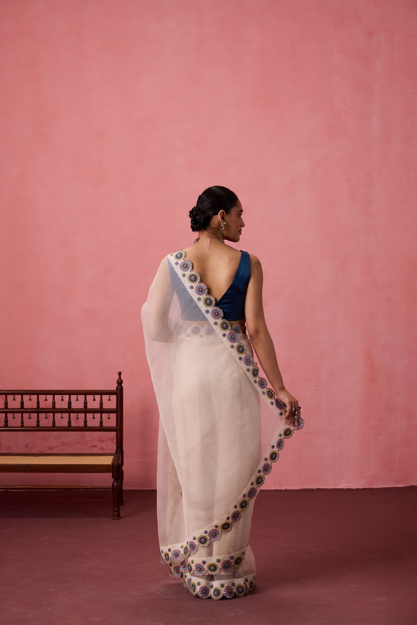 Ivory organza heavy scalloped cutwork embroidered saree comes with unstitched & unembroidered blouse fabric in chanderi