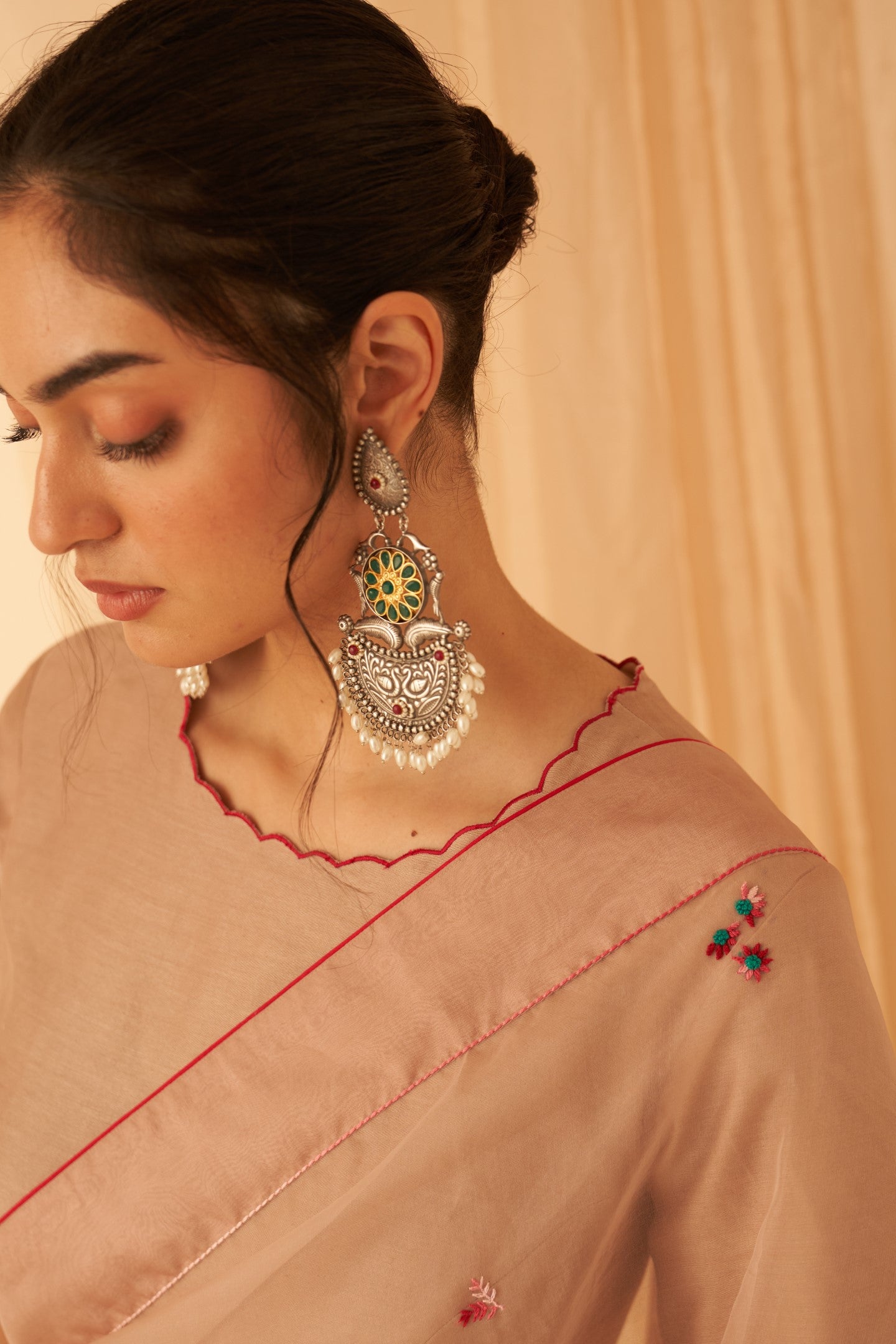 Light rose gold chanderi blouse woth scallop at neckline and sleeves edges