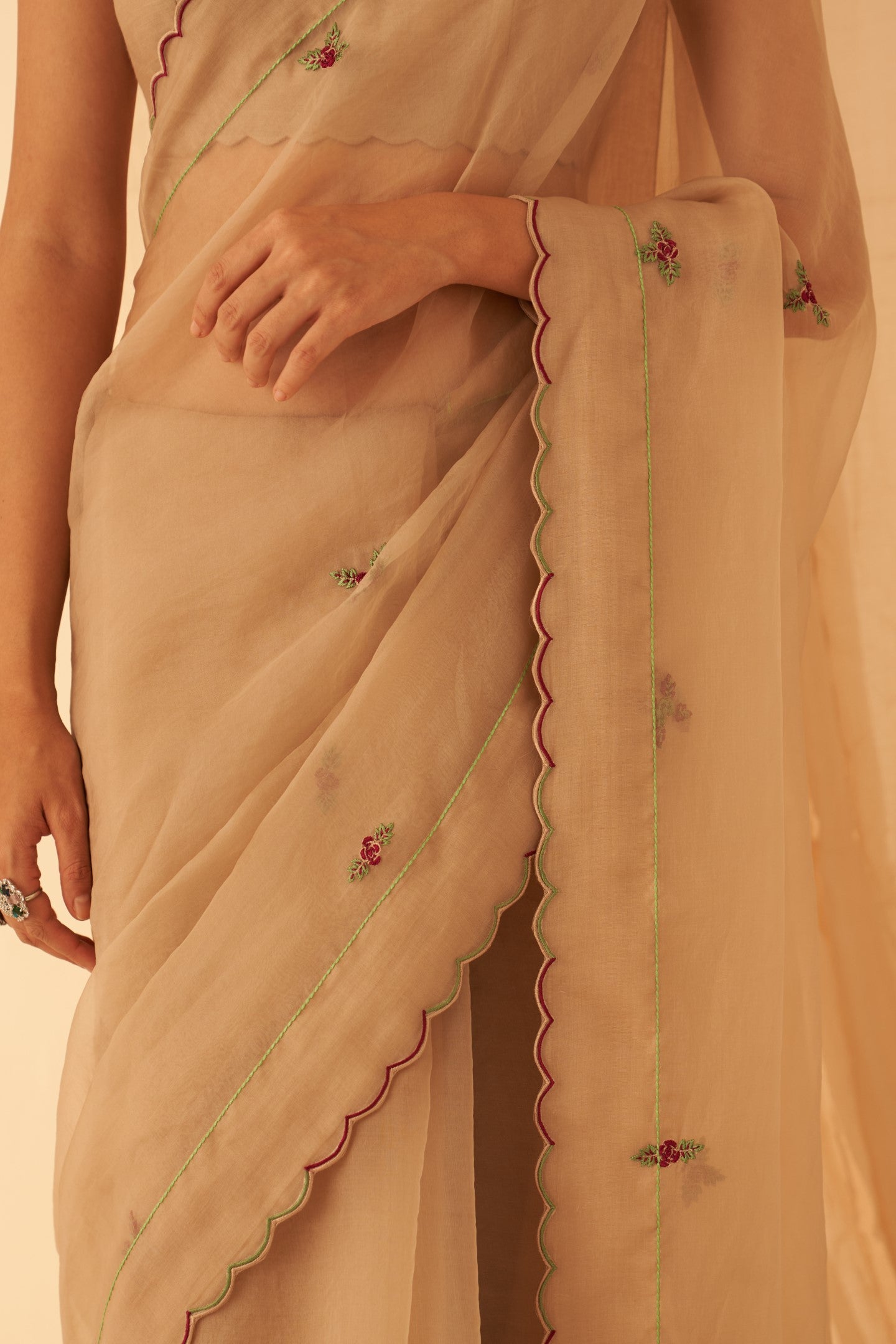 Champagne organza zardozi & elegant resham jaal work saree paired with an organic cotton stitched petticoat