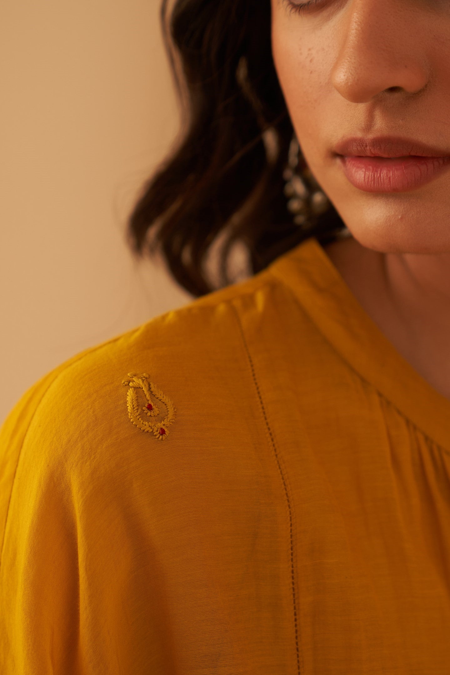 Mustard Chanderi resham buti embroidered tunic paired with cotton slip & Salwar