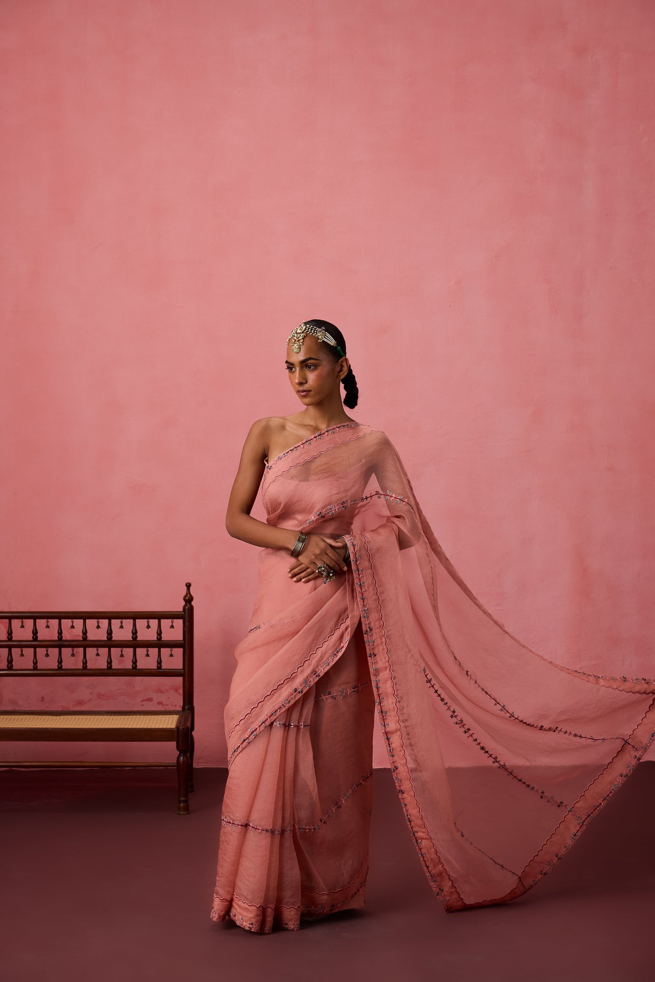 Peach organza embroidered saree comes with unstitched & unembroidered blouse fabric in chanderi