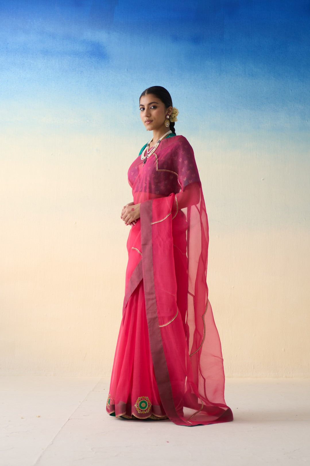 Fuchsia pink organza embroidered saree comes with an organic cotton stitched petticoat (02 Pcs.)