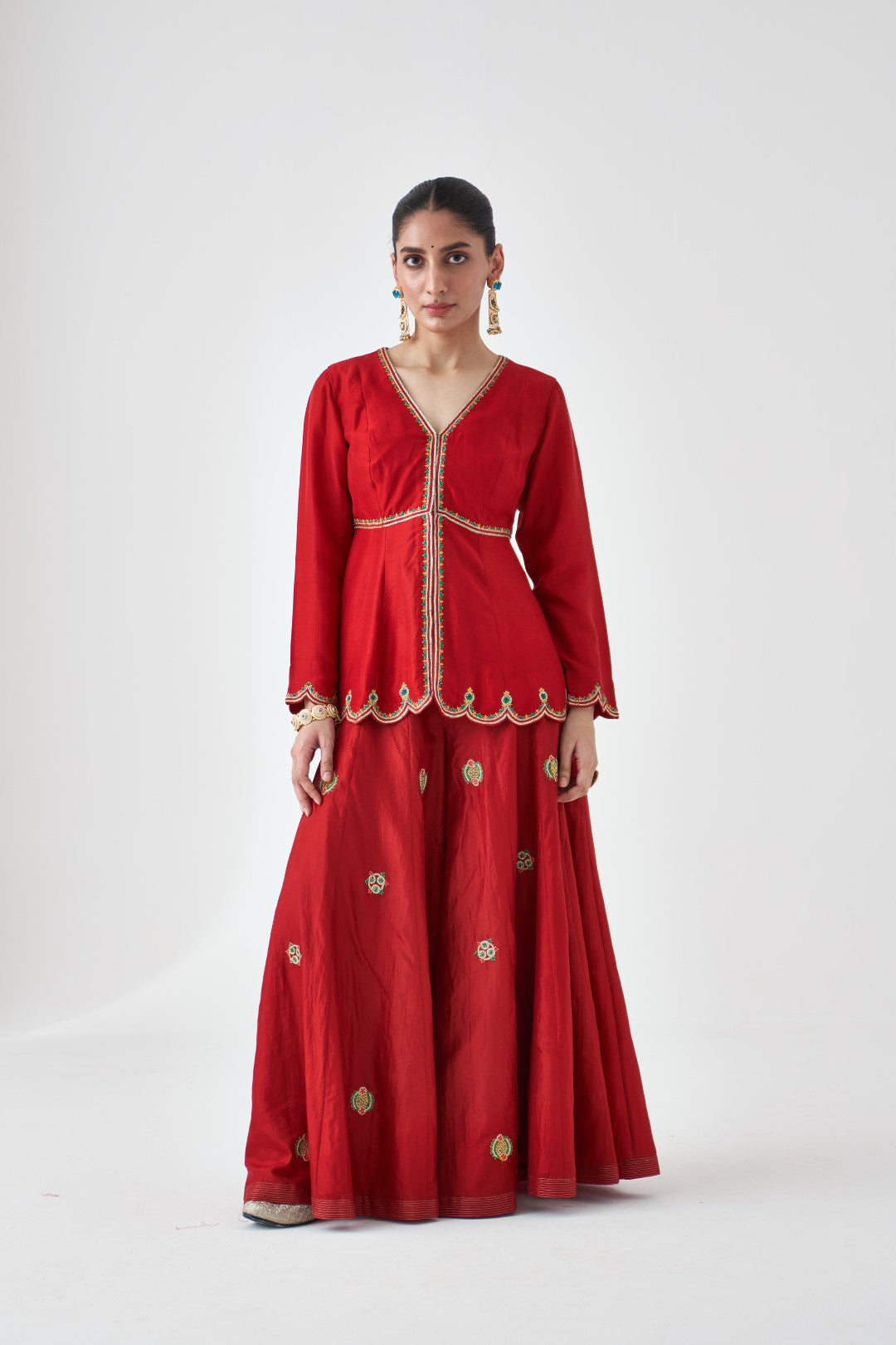 Maroon Silk Dupion Embroidered Peplum Paired with Silk Sharara & Organza Dupatta (03 PCS.)