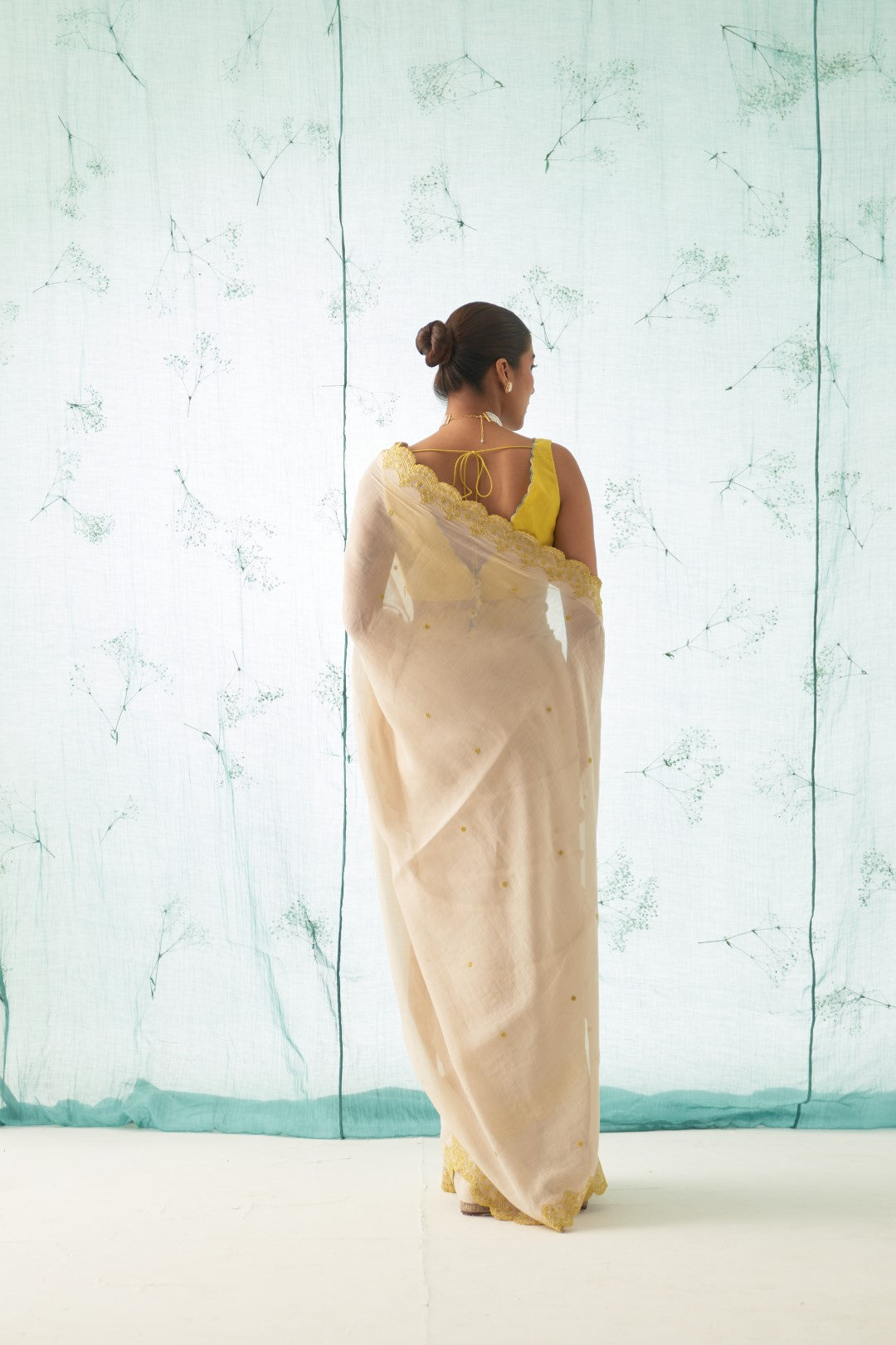 Ivory Chanderi Saree Set with Yellow Scallop Border, Stitched Blouse, and Organic Cotton Petticoat – A Classic Choice in Chanderi Sarees