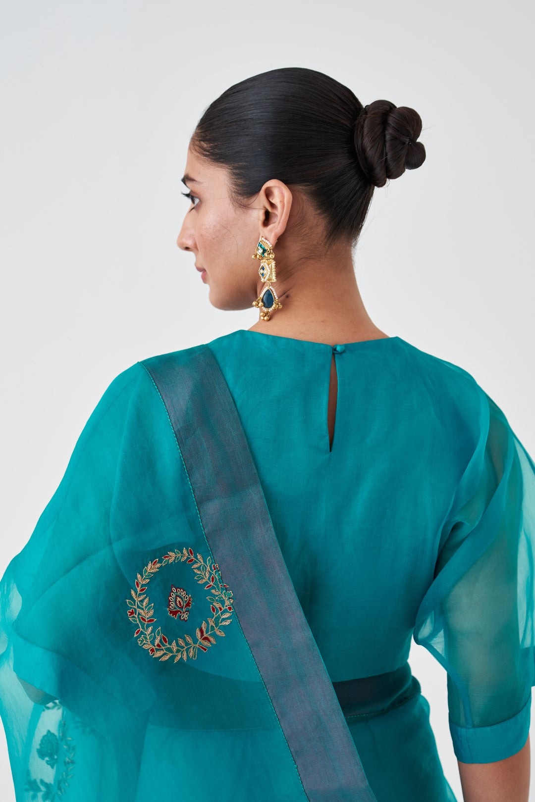 Turquoise Organza Embroidered Saree Paired with Organic Cotton Stitched Petticoat (02 pcs.)