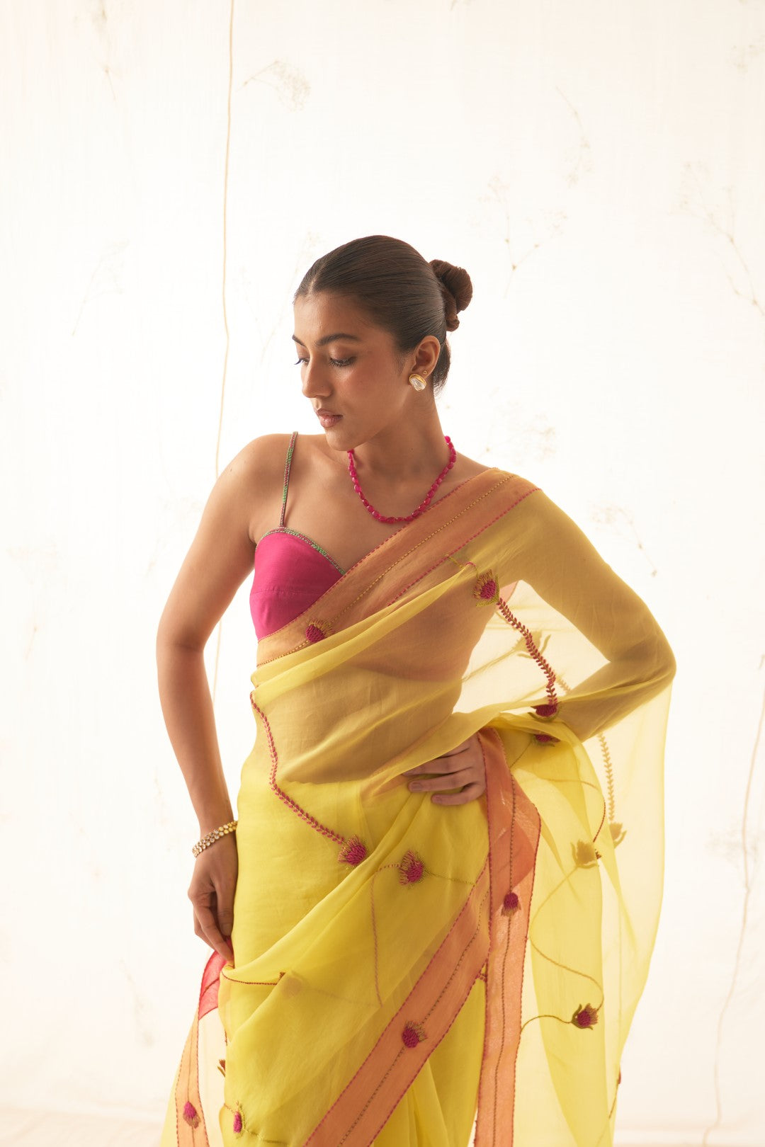 Yellow Organza Saree Set with Pink Border Comes With Stitched Chanderi Blouse and Organic Cotton Stitched Petticoat ( 03 Pcs. )