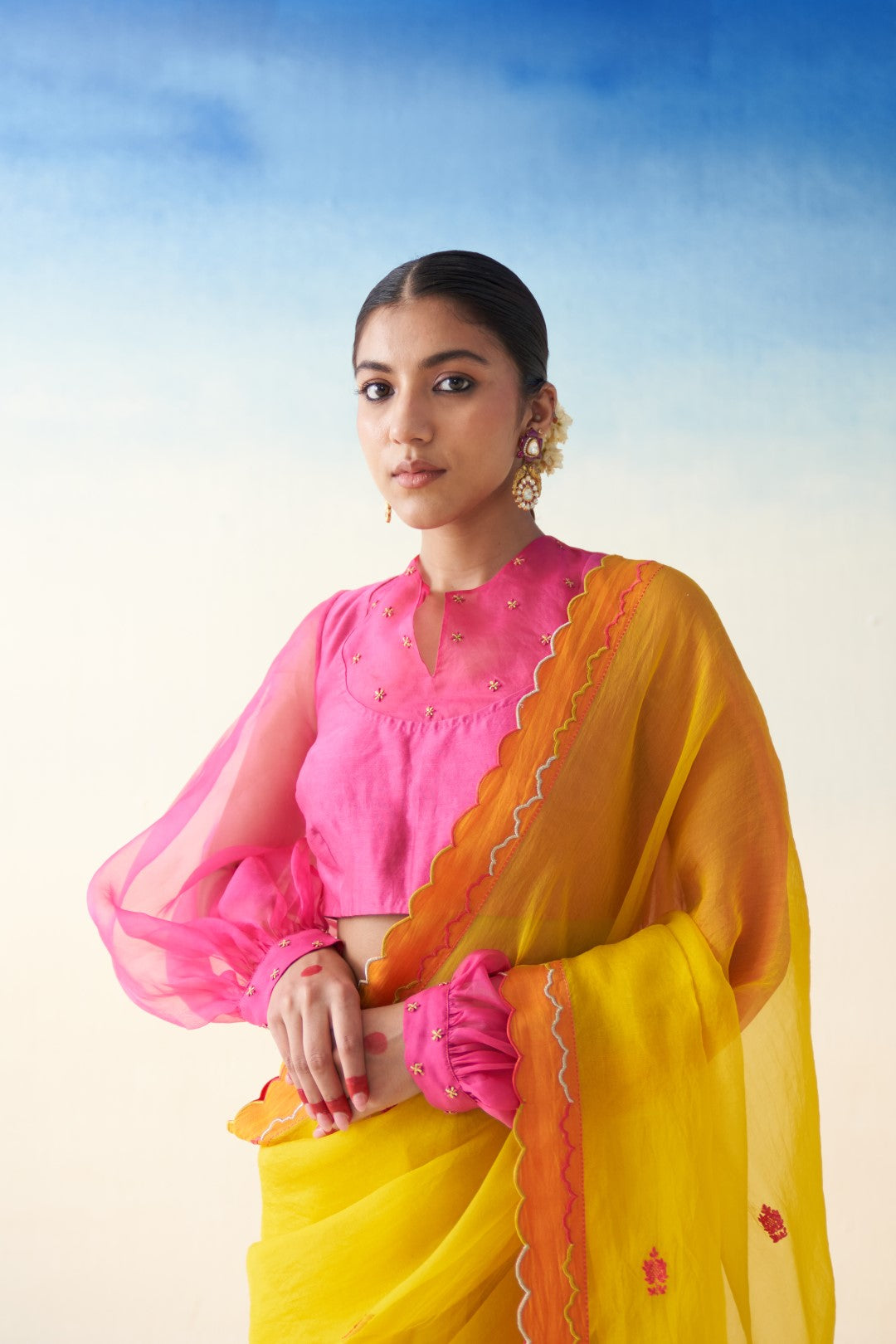 Yellow organza embroidered scallop border saree comes with an organic cotton stitched petticoat (02 Pcs.)