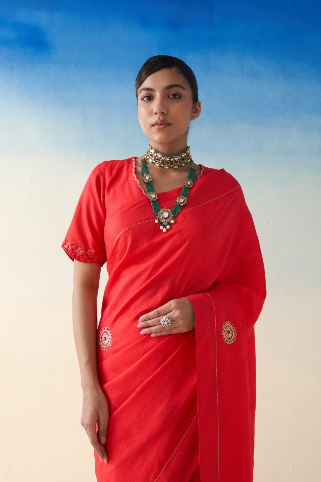 Red silk embroidered motifs saree comes with an organic cotton stitched petticoat (02 Pcs.)