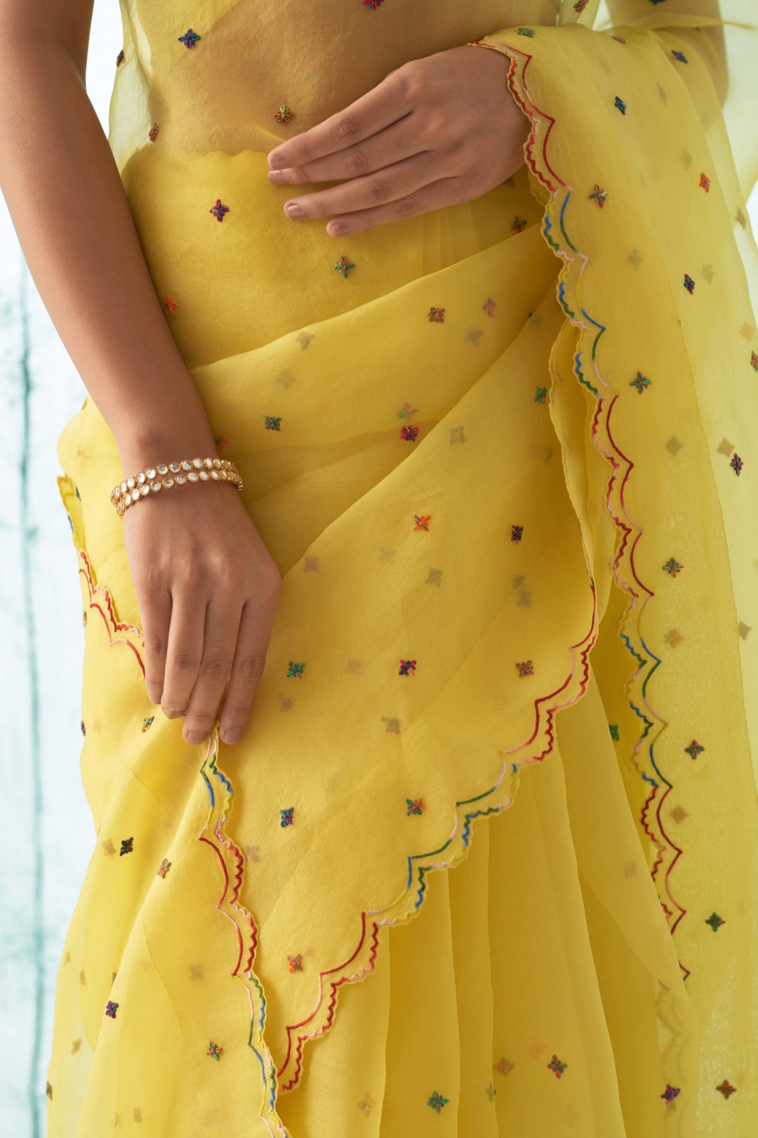 Yellow Organza Saree Set with Scallop Border Comes With Stitched Chanderi Blouse and Organic Cotton Stitched Petticoat ( 03 Pcs. )