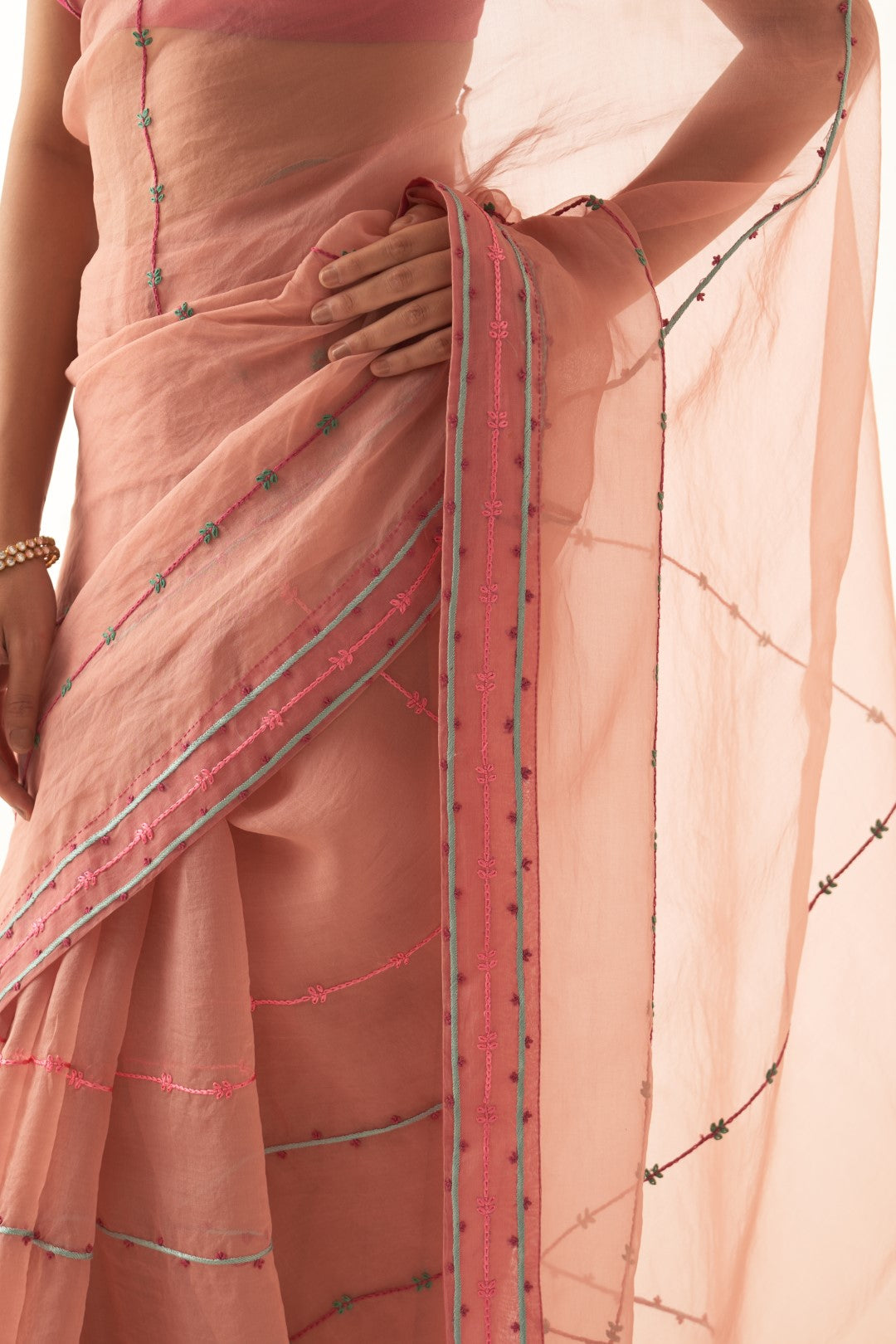 Peach Organza Saree with Embroidery Allover Comes With Chanderi Stitched Blouse and Organic Cotton Stitched Petticoat ( 03 Pcs. )