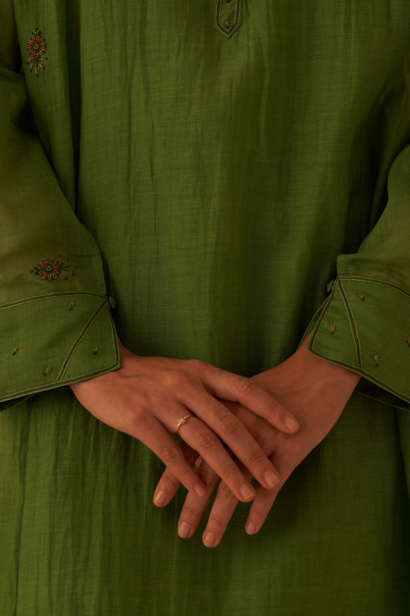 Green chanderi resham buti embroidered tunic paired with cotton slip & salwar