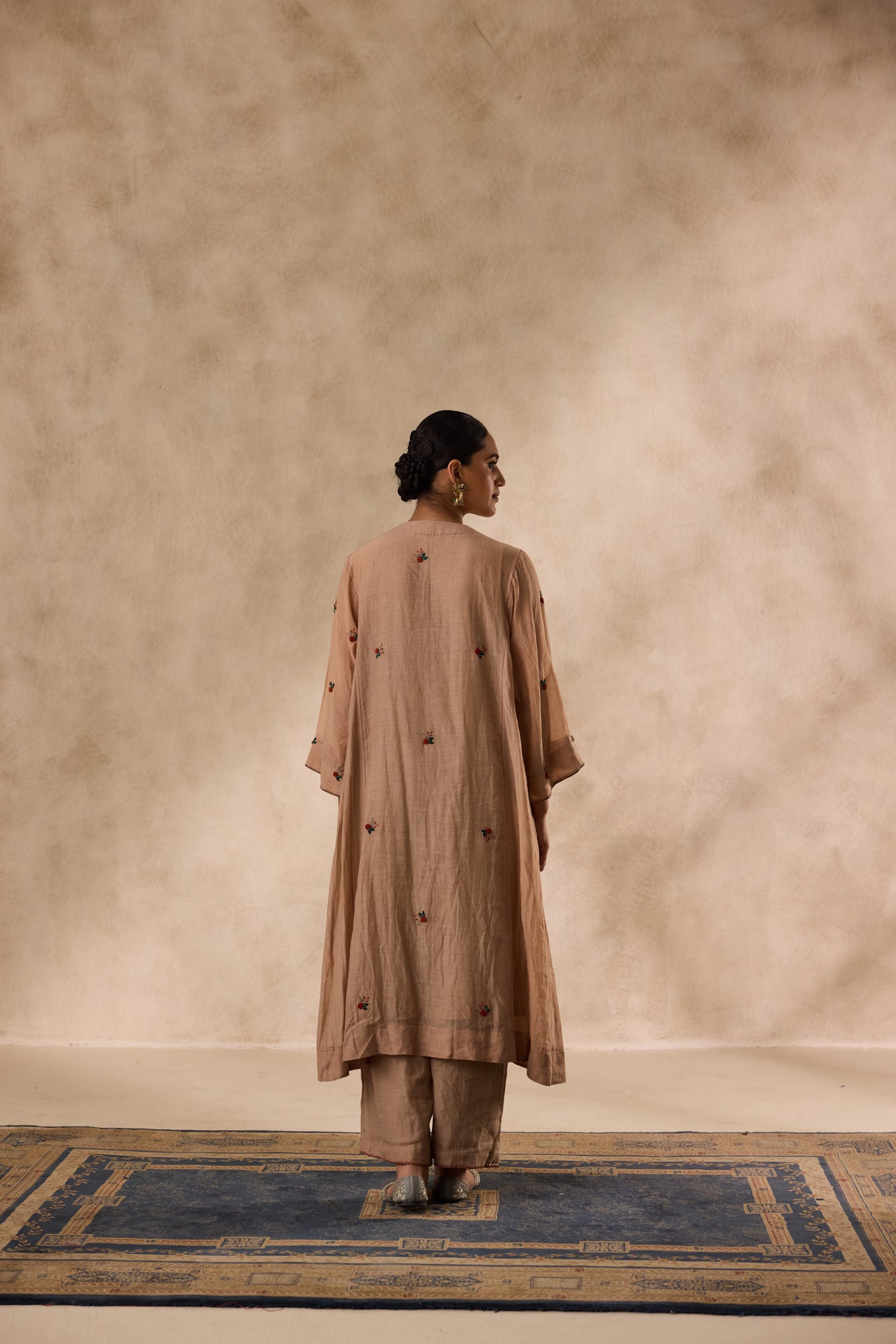 Champagne chanderi embroidered kurta paired with organic cotton slip, pant & organza dupatta