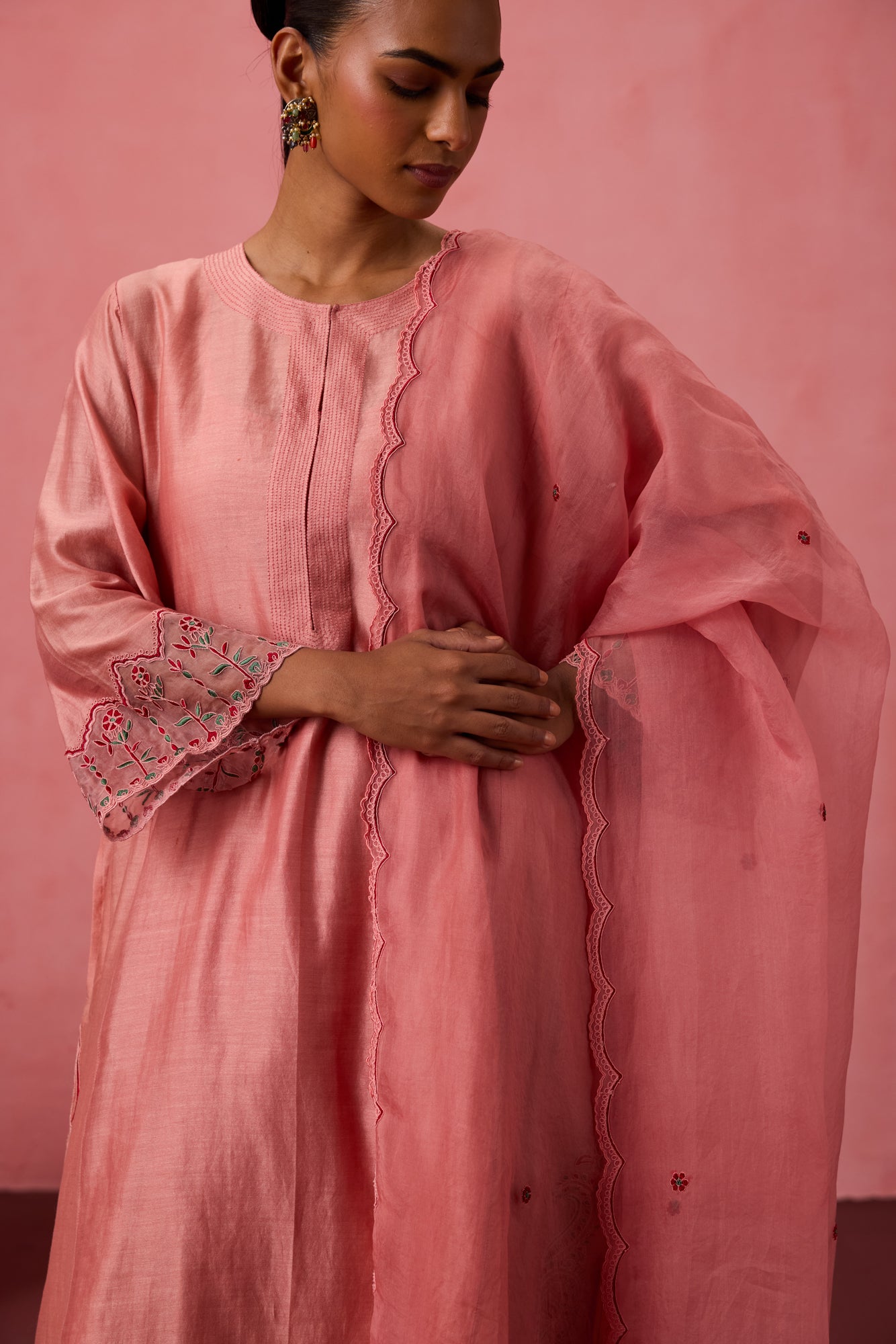 Peach chanderi embroidered kurta with embellished border on sleeves paired with pant & organza dupatta