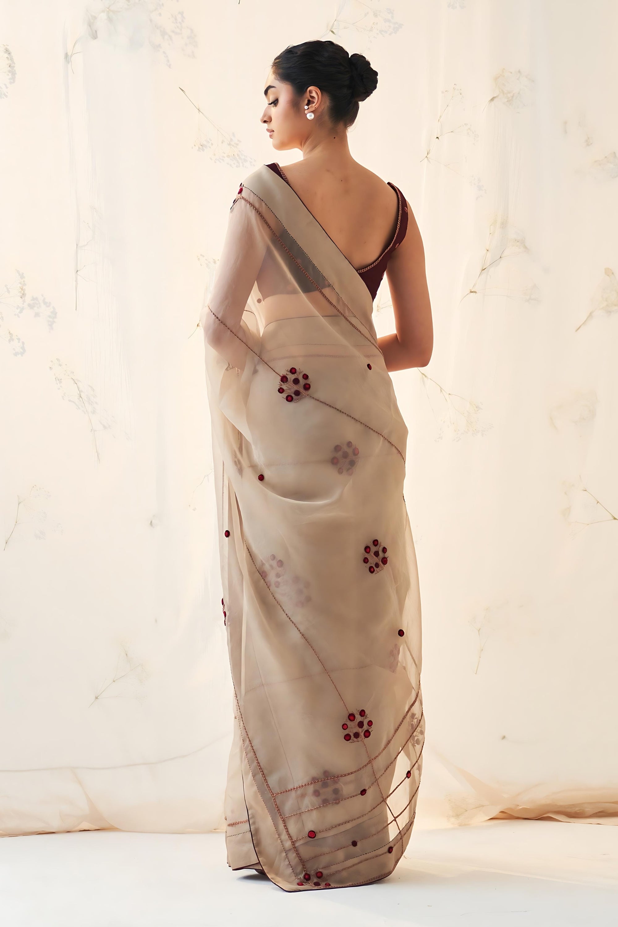 Champagne Gold organza saree comes with mehroon chanderi stitched blouse & organic cotton stitched petticoat