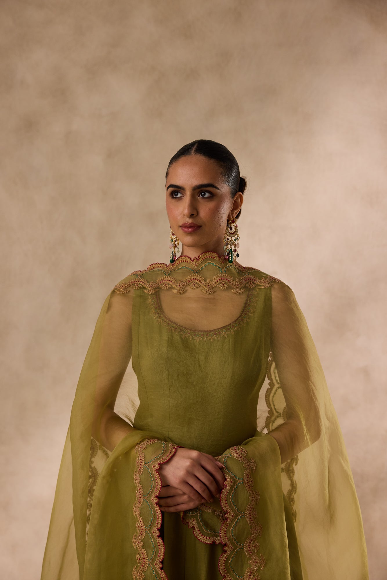 Mehendi green cotton silk dori work and resham embroiderd anarkali paired with pant & organza heavy border dupatta