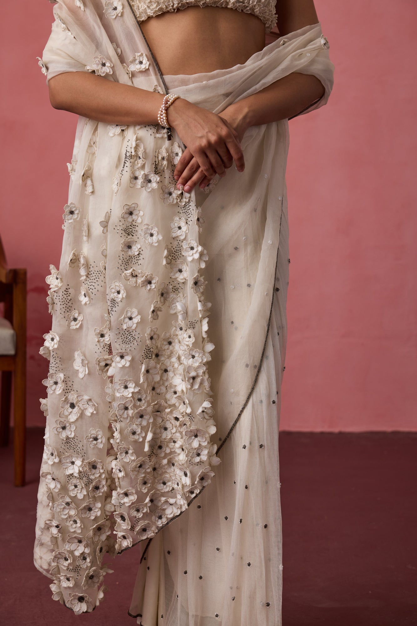 White soft net & organza blooming flower embroidered saree paired with unstitched & unembroidered soft net fabric