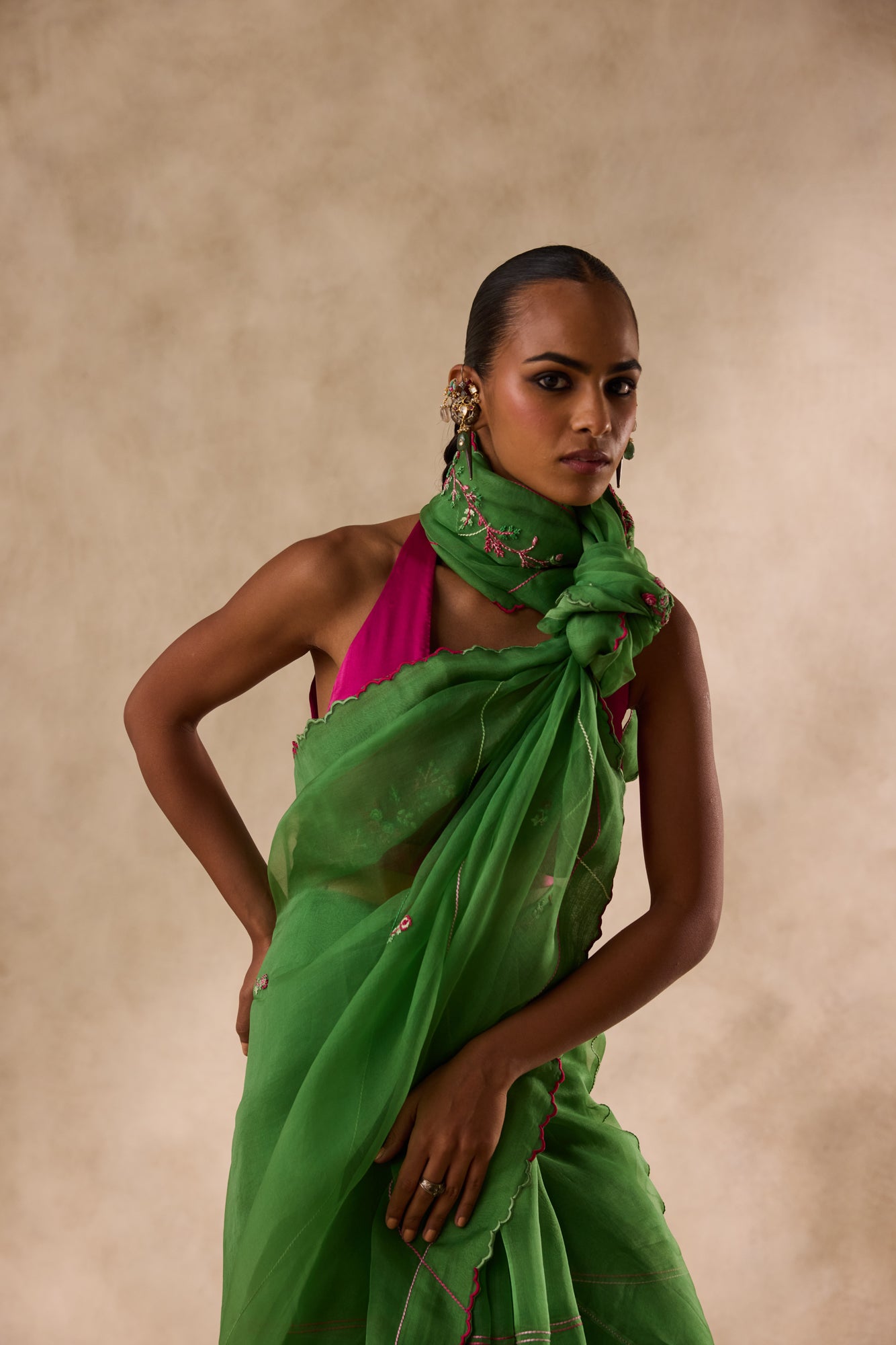 Green organza embroidered saree comes with unstitched & unembroidered blouse fabric in chanderi