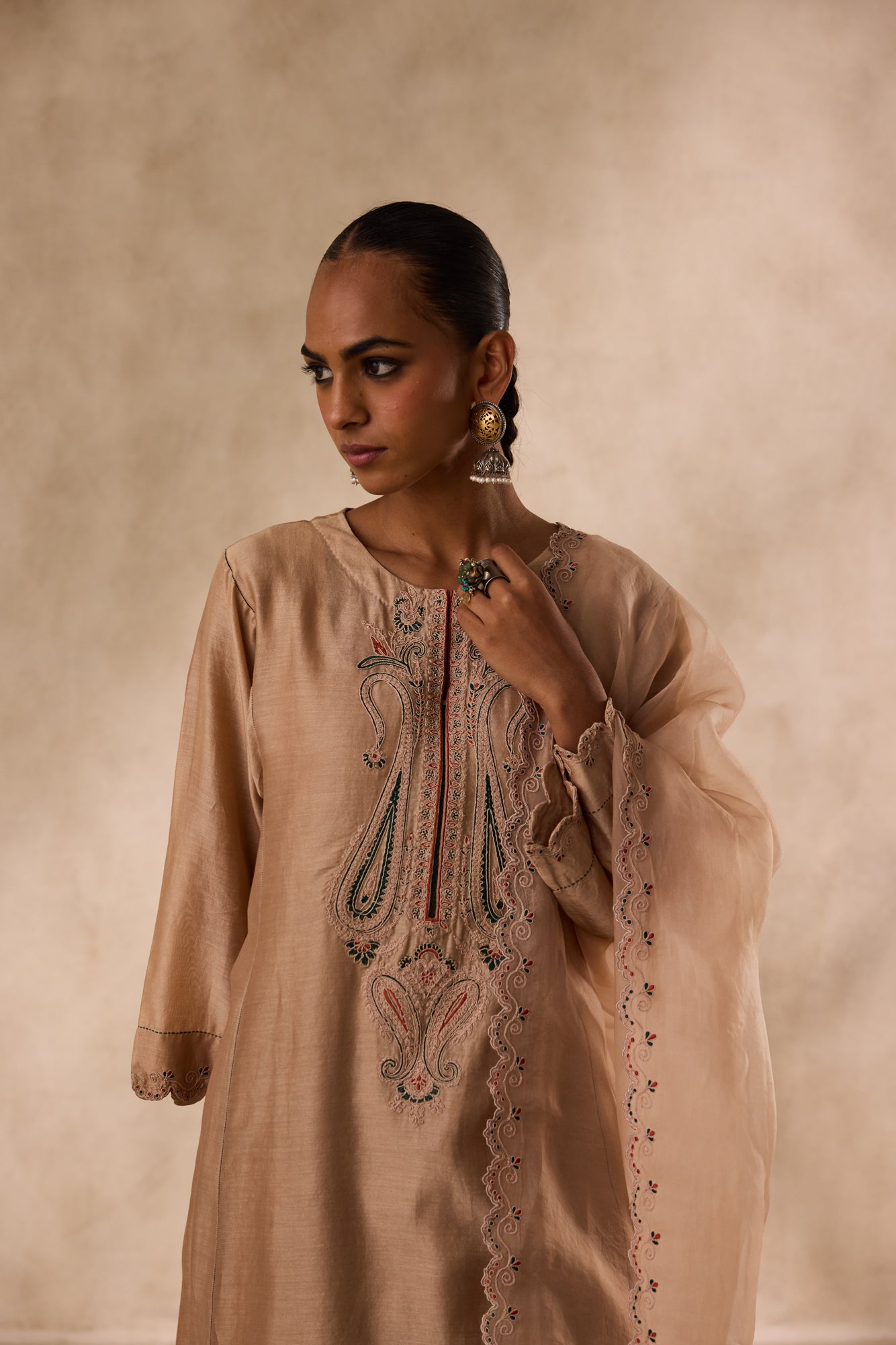 Champagne chanderi dori work embroidered kurta paired with organic cotton slip, afgani salwar & organza dupatta