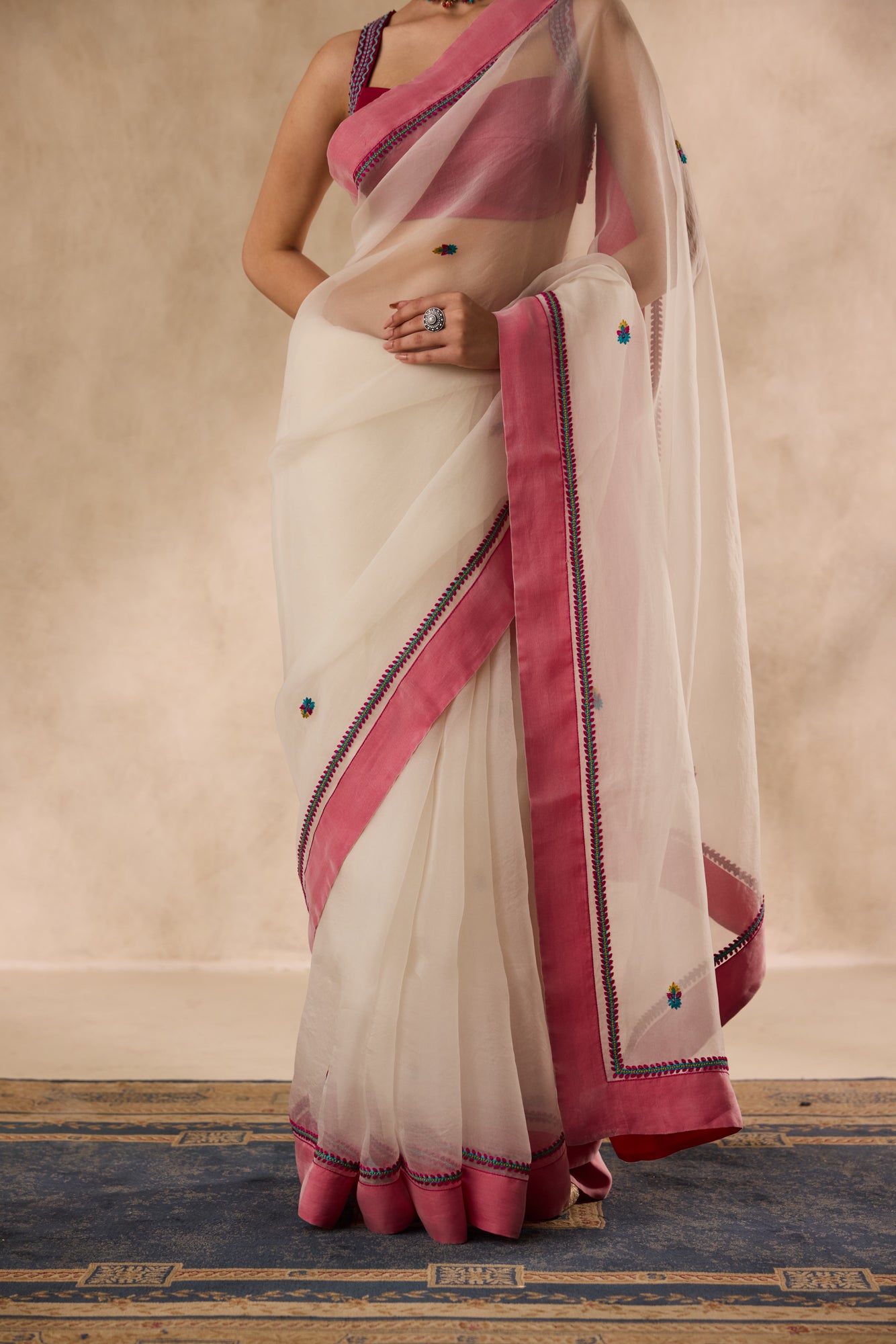 Ivory organza rasham buti embroidered saree comes with unstitched & unembroidered blouse fabric in chanderi