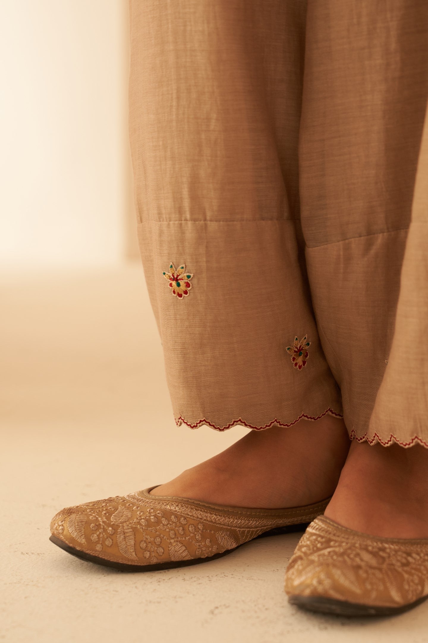 Champagne Chanderi floral buti embroidered tunic paired with cotton slip & afghani salwar