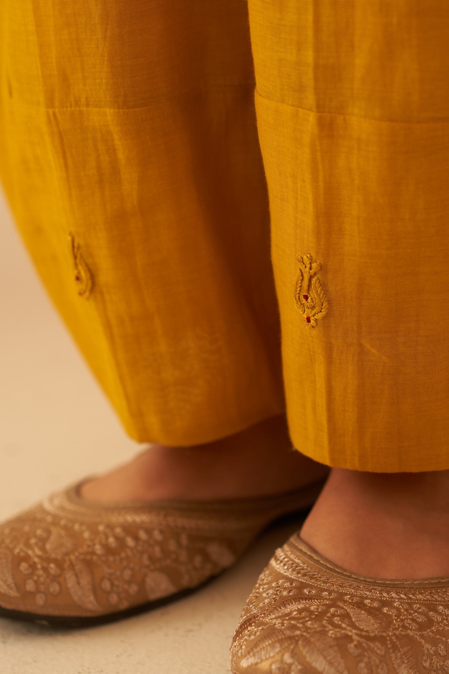 Mustard Chanderi resham buti embroidered tunic paired with cotton slip & Salwar