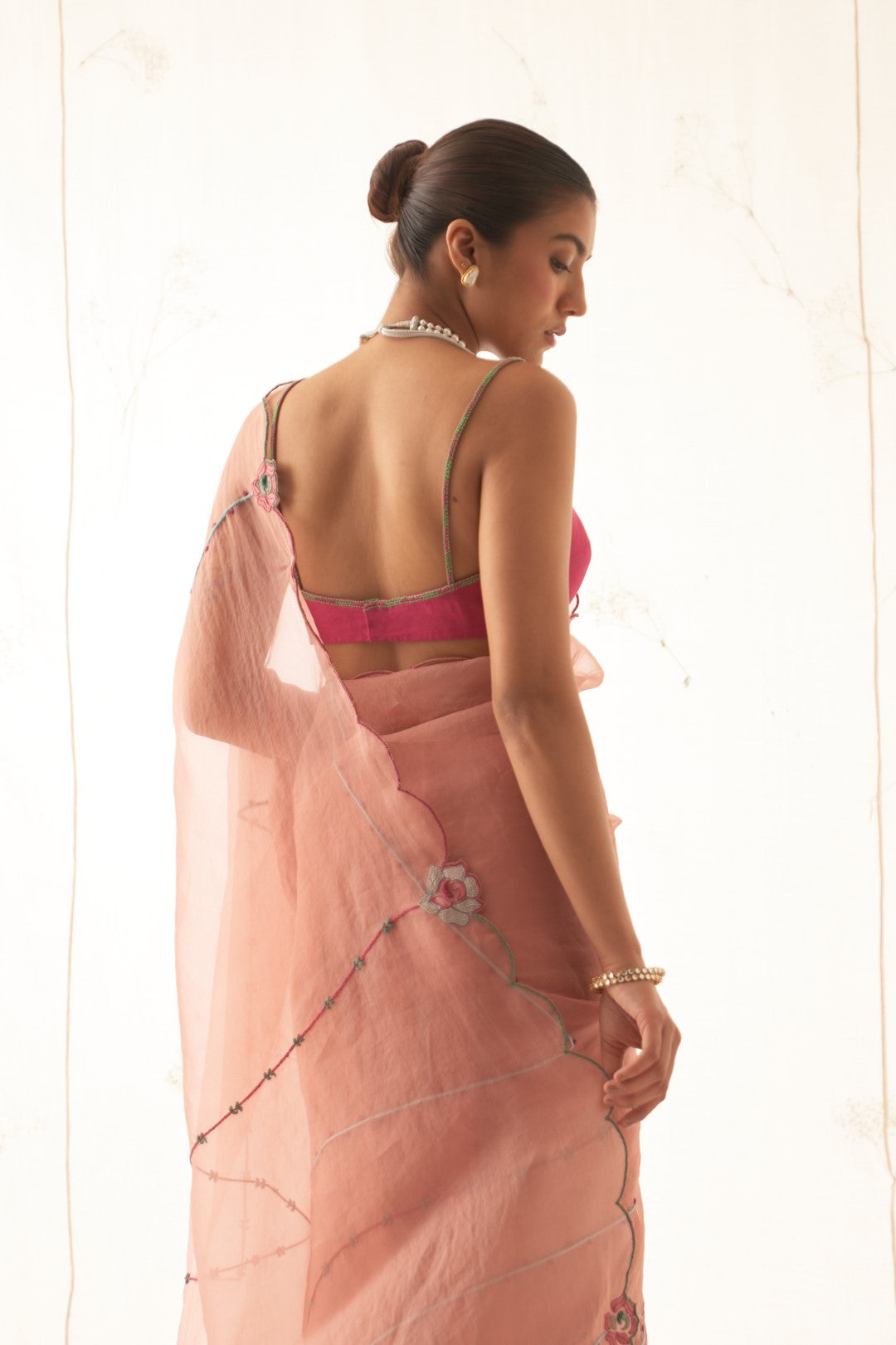 Peach Organza Saree with Embroidery Allover Comes With Chanderi Stitched Blouse and Organic Cotton Stitched Petticoat ( 03 Pcs. )