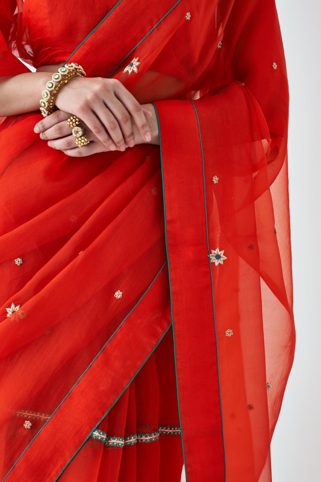 Orange Embroidered Organza Saree Paired with Organic Cotton Stitched Petticoat (02 Pcs.)