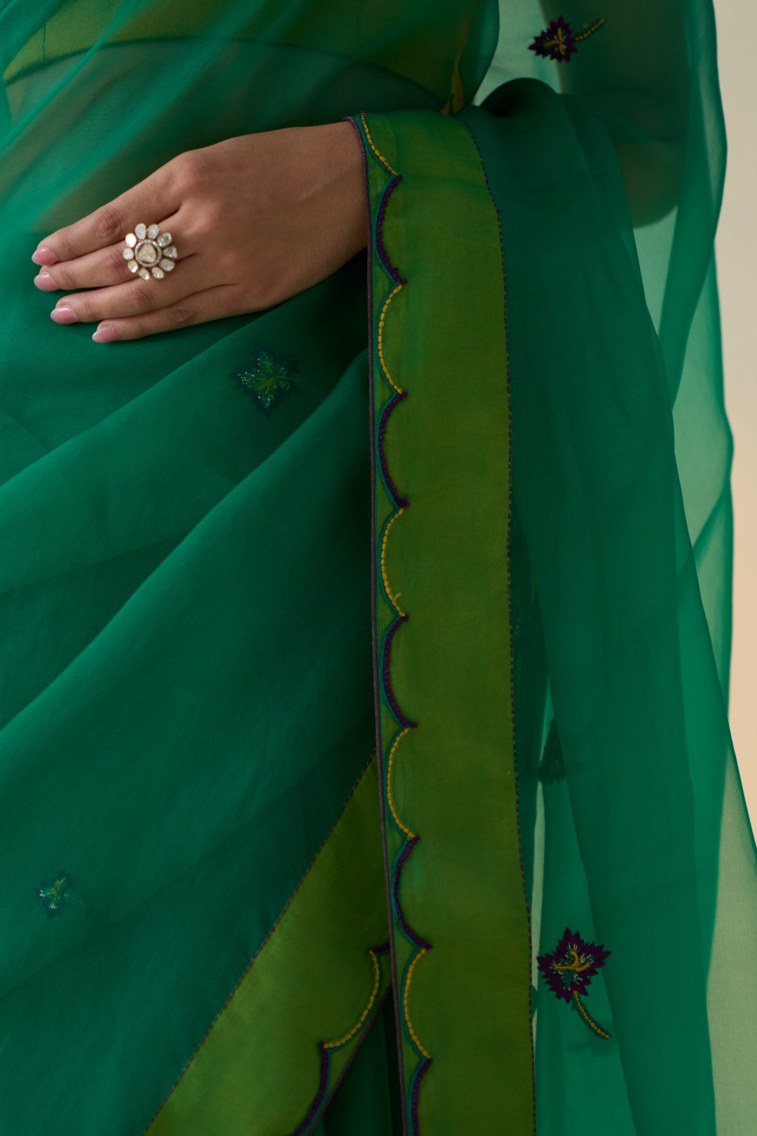 Green organza embroidered & scallop border saree comes with an organic cotton petticoat. (02 Pcs.)
