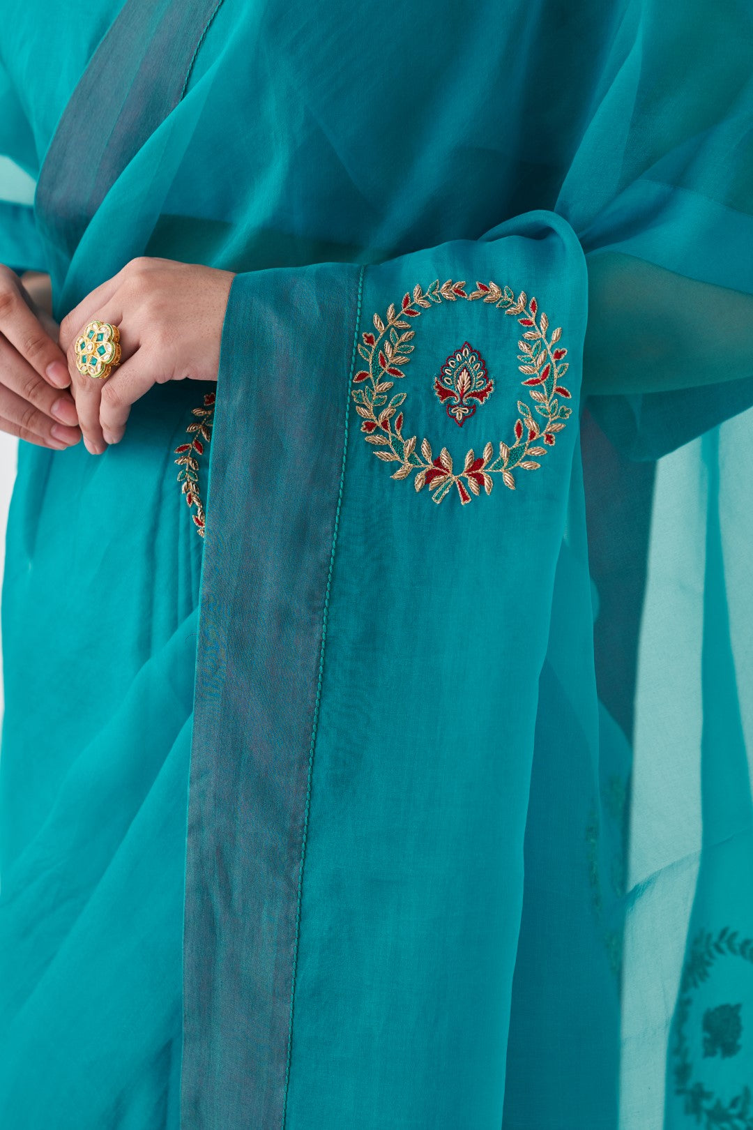 Turquoise Organza Embroidered Saree Paired with Organic Cotton Stitched Petticoat (02 pcs.)