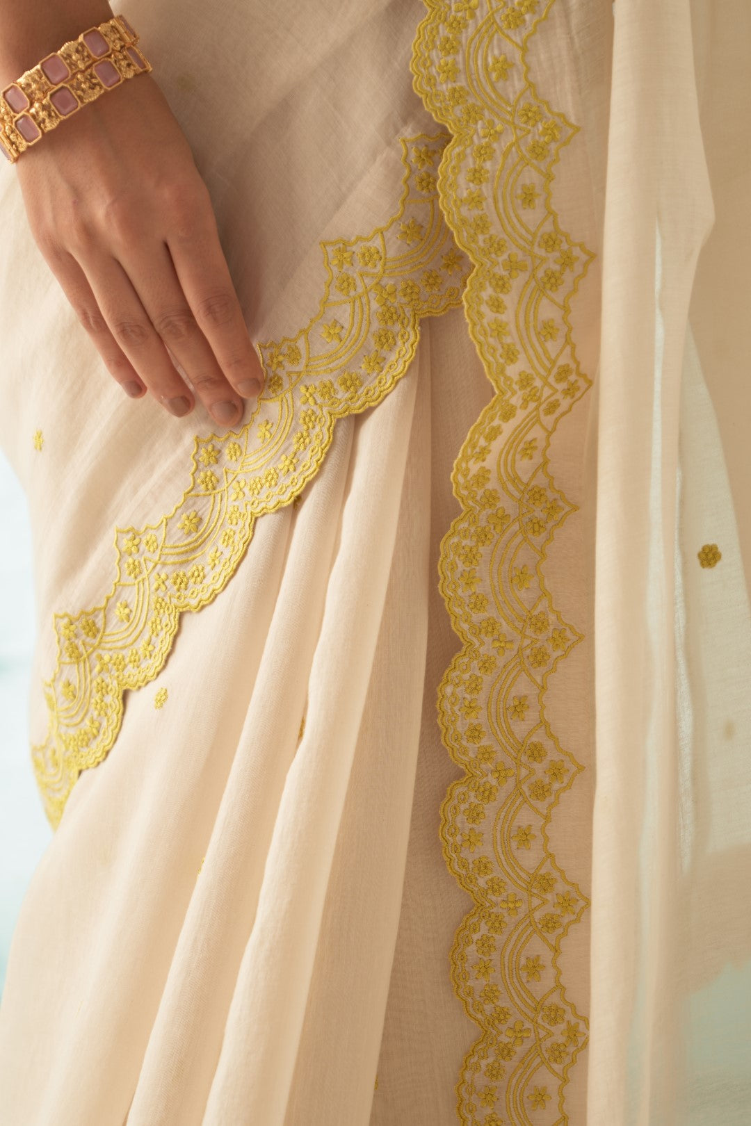 Ivory Chanderi Saree Set with Yellow Scallop Border, Stitched Blouse, and Organic Cotton Petticoat – A Classic Choice in Chanderi Sarees