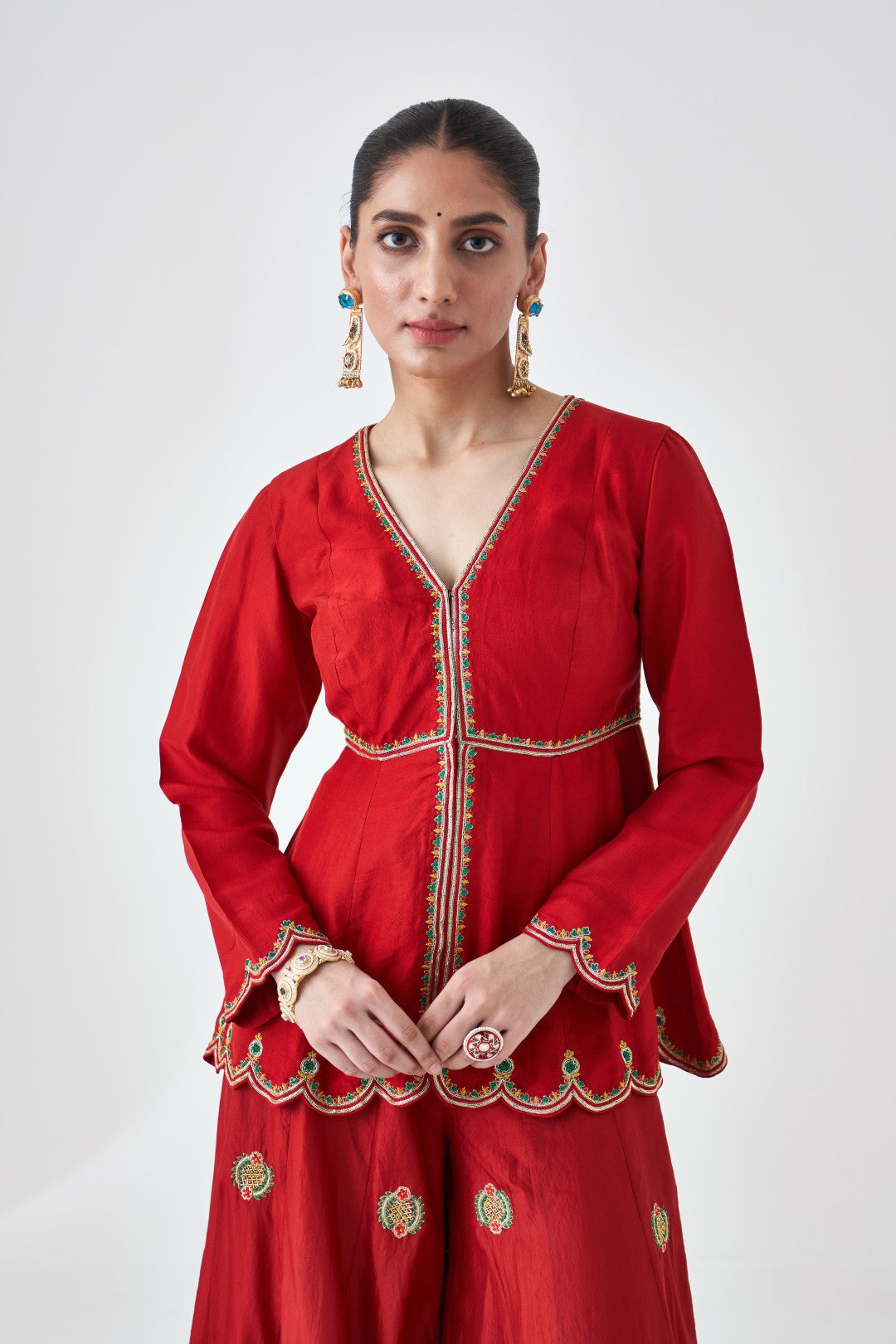 Maroon Silk Dupion Embroidered Peplum Paired with Silk Sharara & Organza Dupatta (03 PCS.)