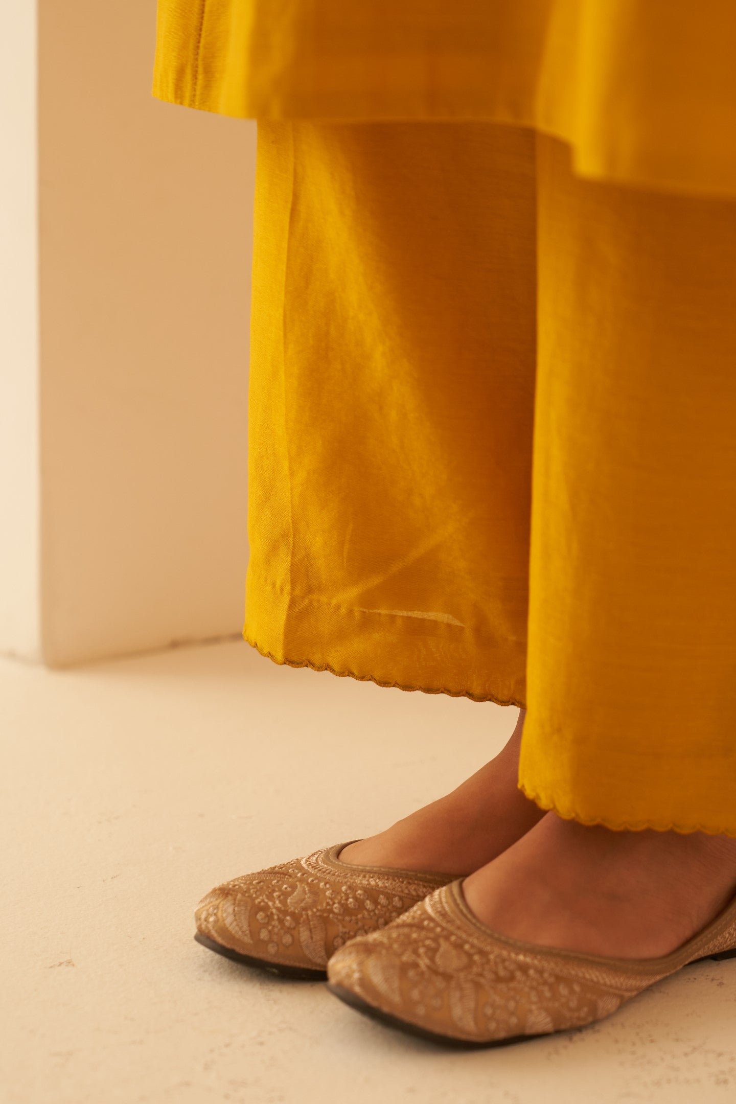 Mustard Chanderi floral embroidered and katha stitched work kurta paired with pant & organza dupatta